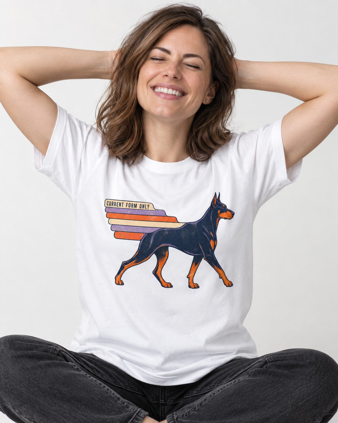 Doberman Current Form Only Speed Bars Graphic T-Shirt in White, worn by a seated model