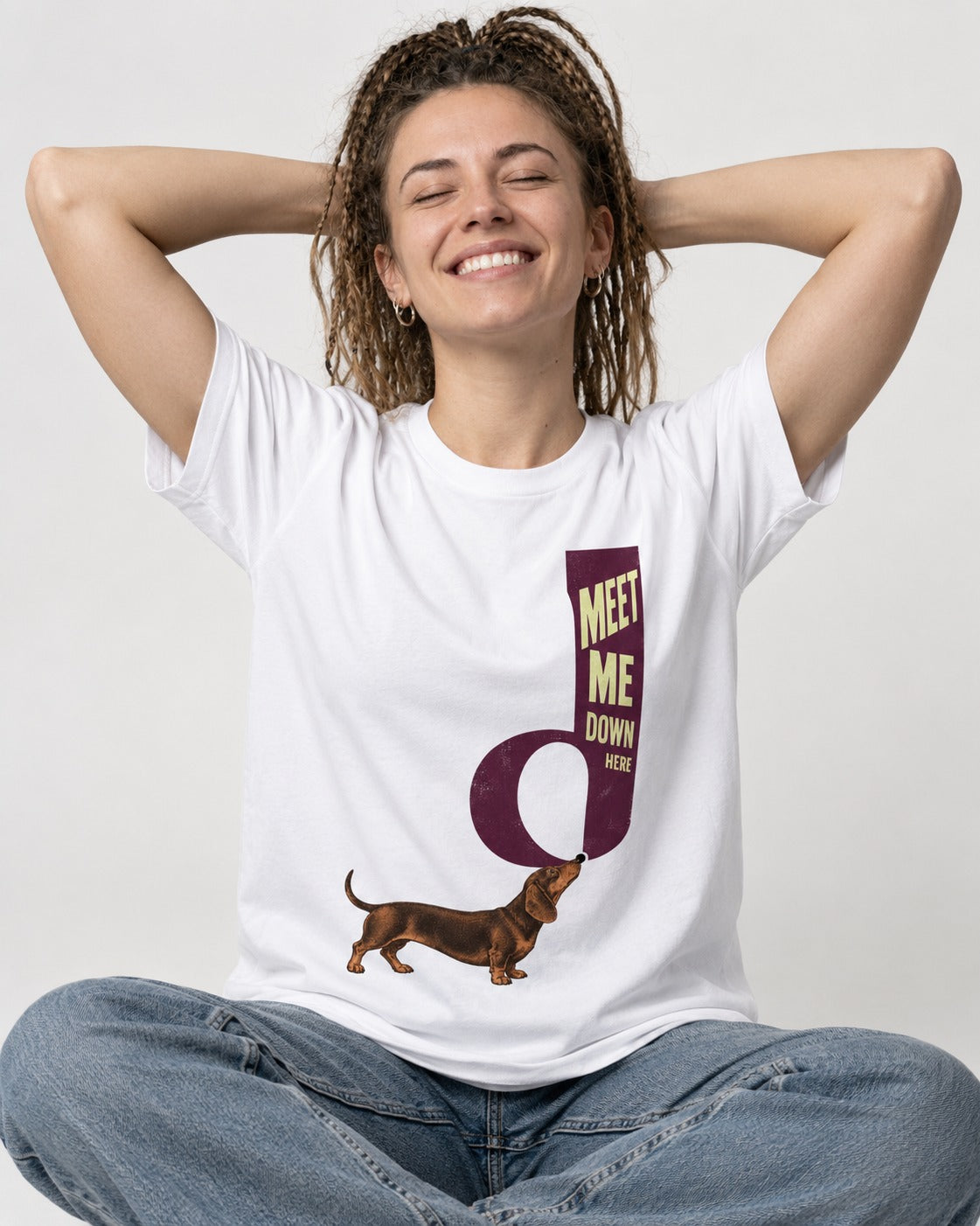 Dachshund Meet Me Down Here Letterform Loop Graphic T-Shirt in White, worn by a seated model