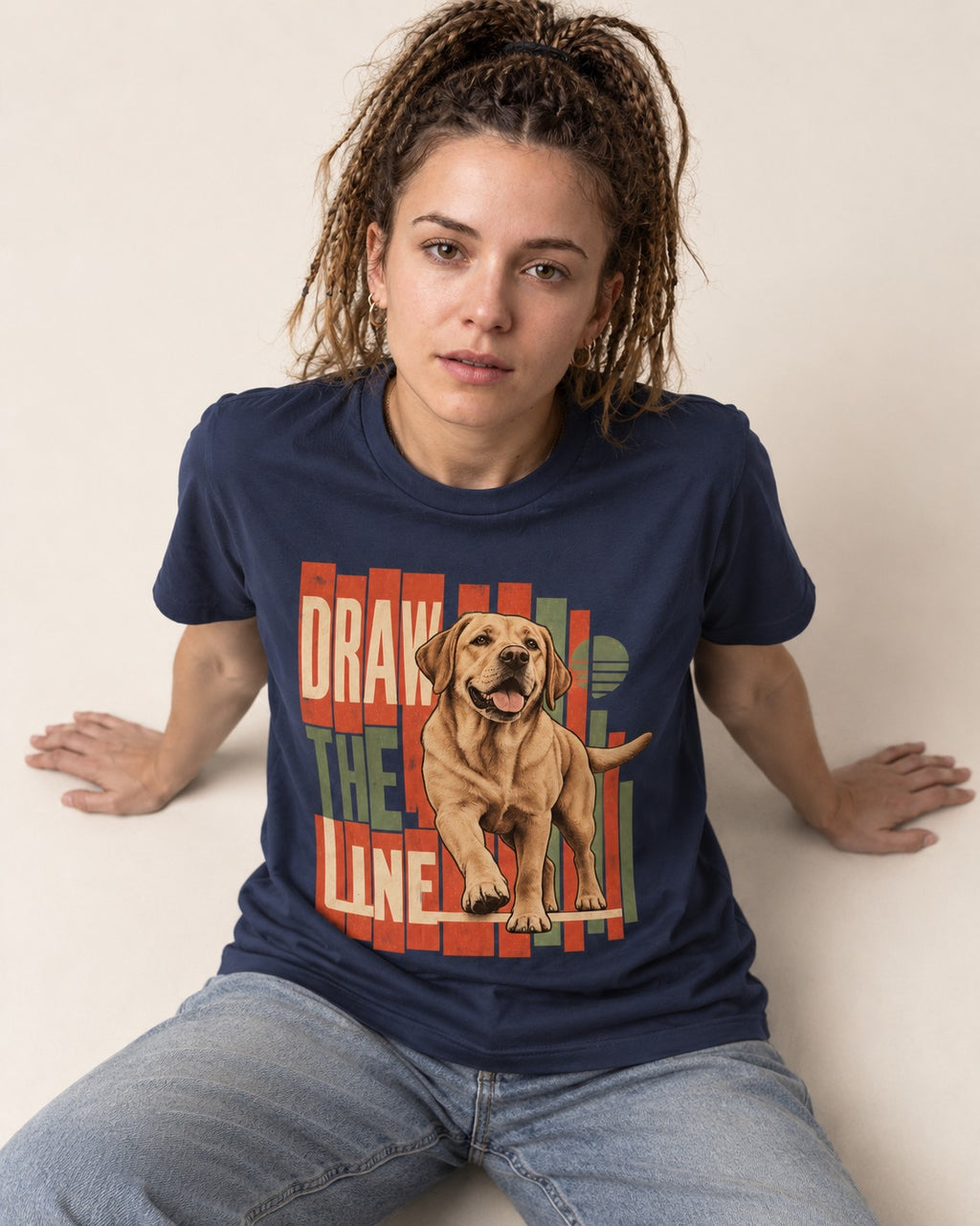 Labrador Retriever Draw the Line Stepping Graphic T-Shirt in Navy, worn by a seated model