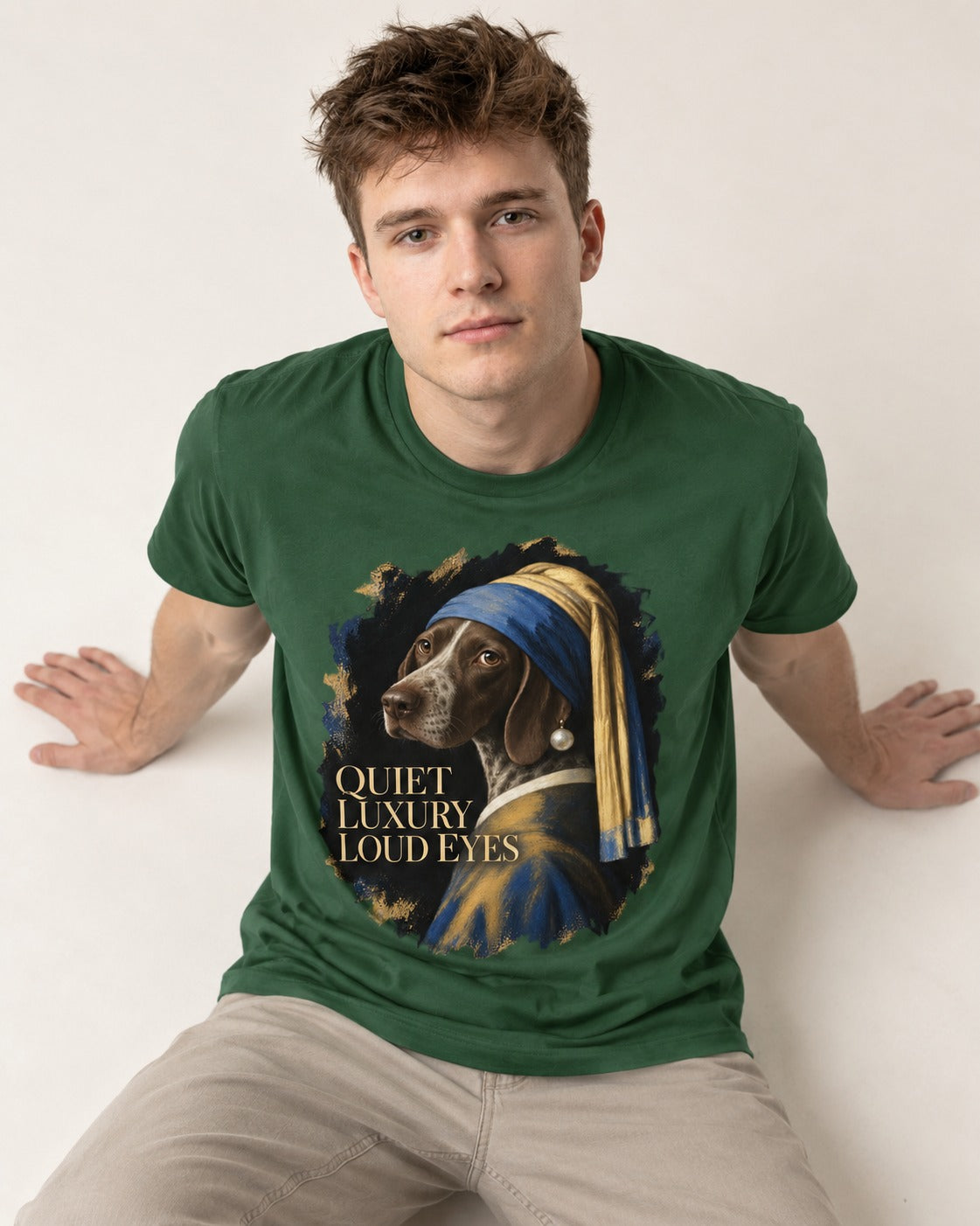 German Shorthaired Pointer Quiet Luxury Loud Eyes Pearl Earring Portrait Graphic T-Shirt in Forest Green, worn by a seated model