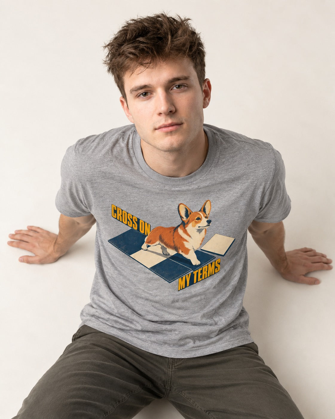 Corgi On My Terms T-Shirt in Sport Grey, worn by a seated model