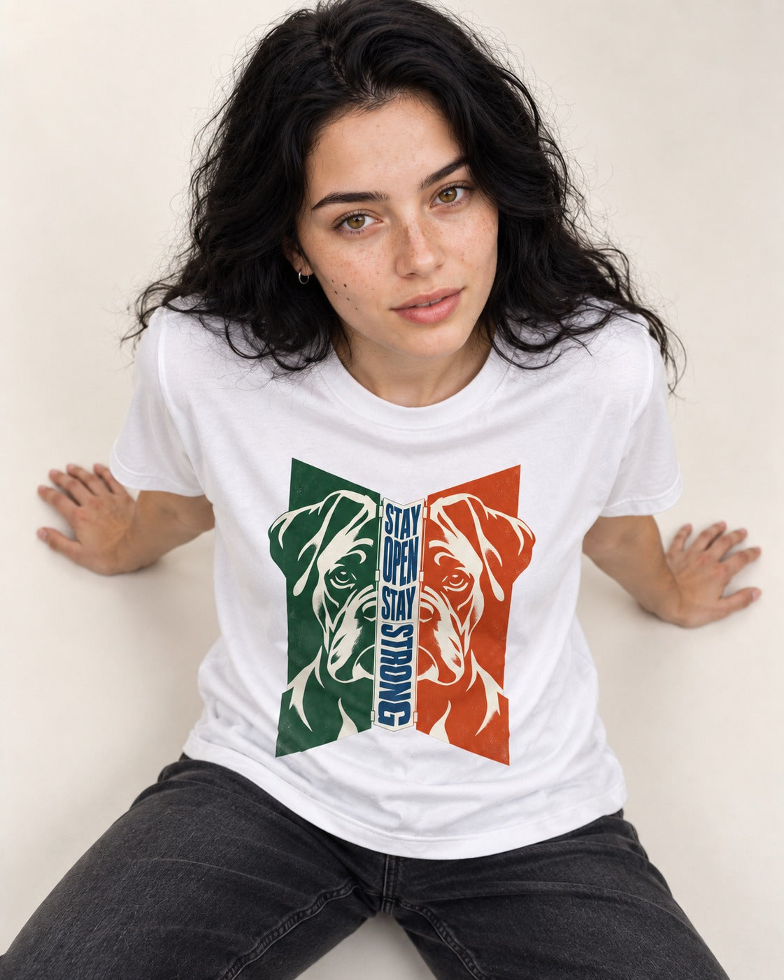 Boxer Stay Open Stay Strong T-Shirt in White, worn by a seated model