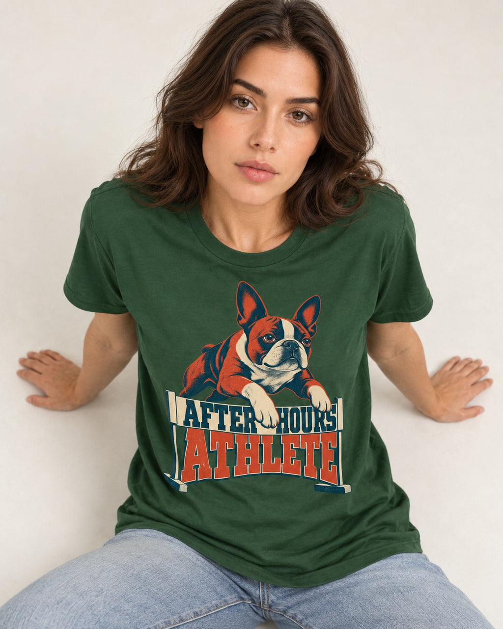 After Hours Athlete Boston Terrier T-Shirt in Forest Green, worn by a seated model