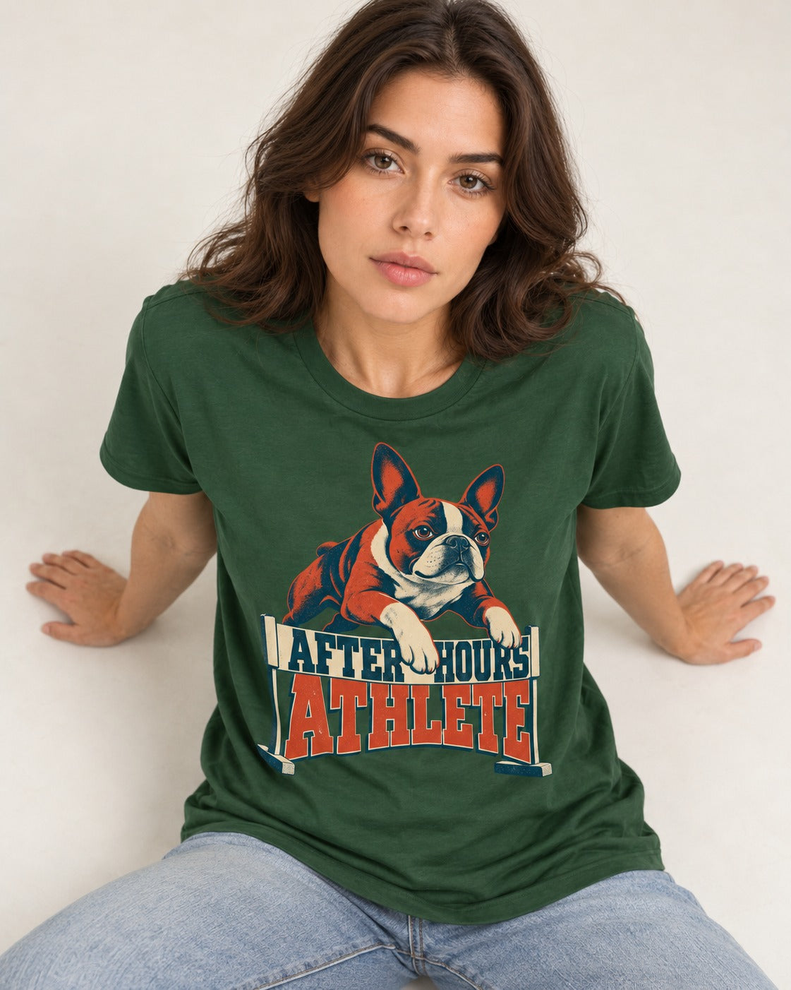 After Hours Athlete Boston Terrier T-Shirt in Forest Green, worn by a seated model
