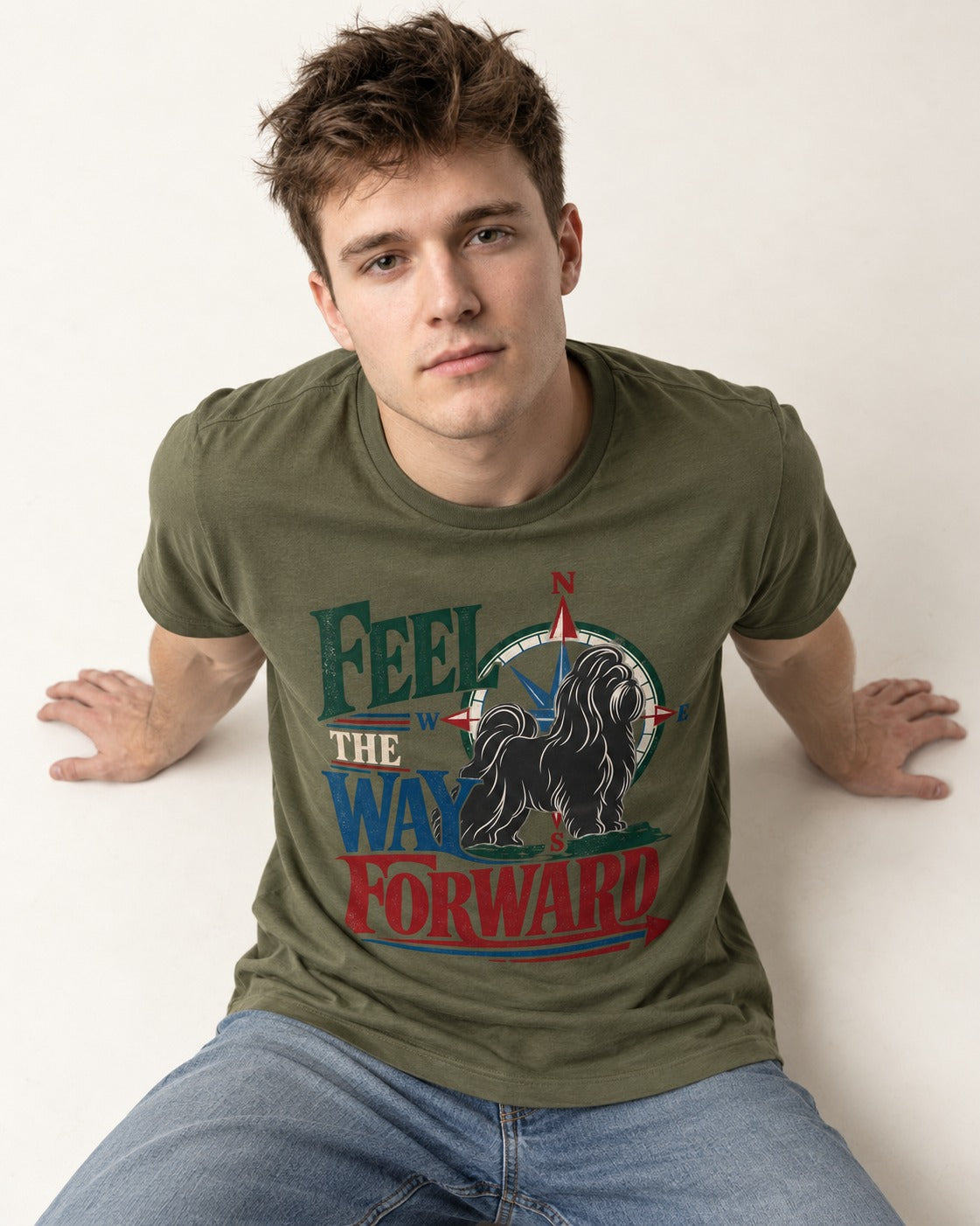 Shih Tzu Feel the Way Forward Compass Graphic T-Shirt in Heather Military Green, worn by a seated model