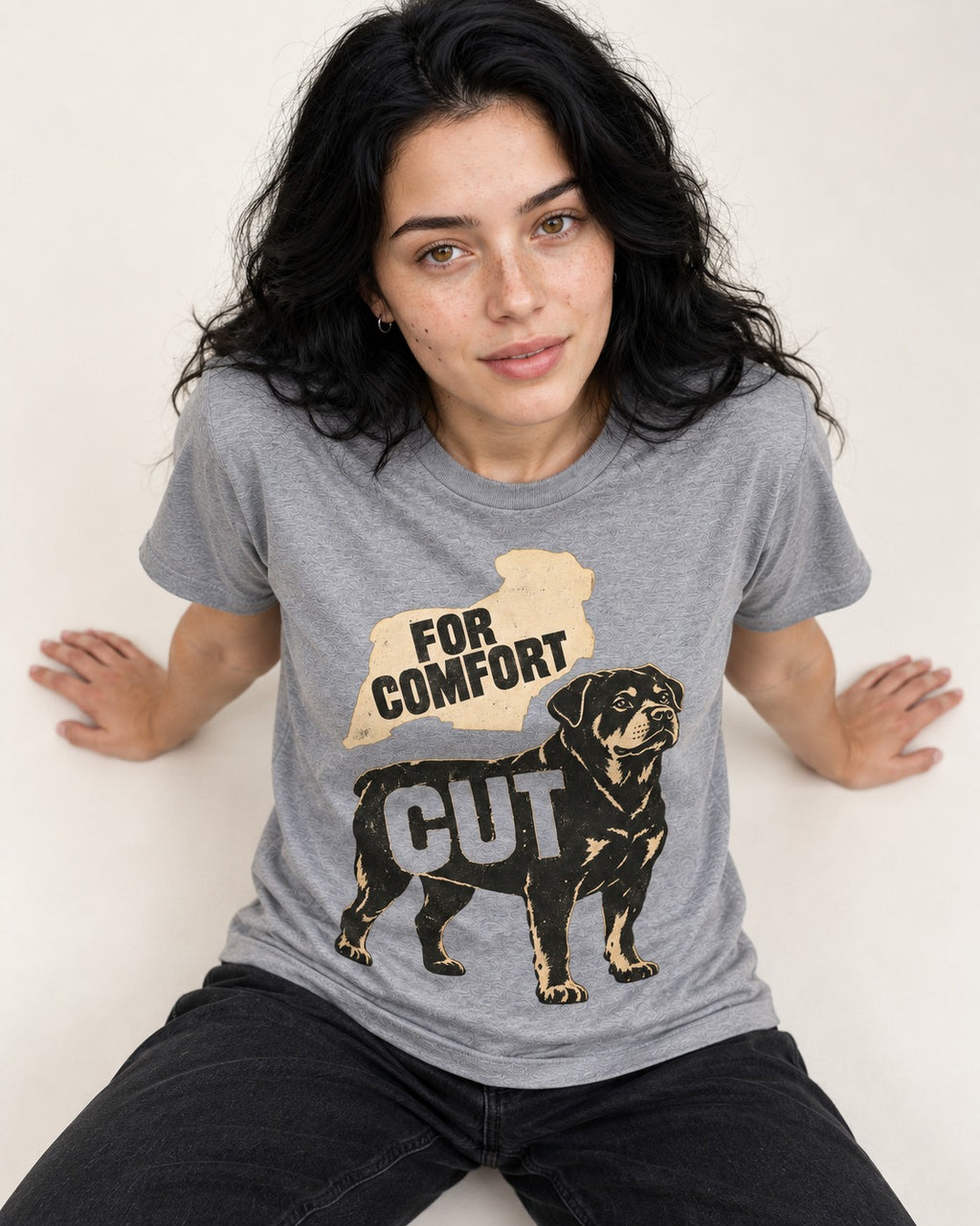 Rottweiler Cut for Comfort T-Shirt in Sport Grey, worn by a seated model