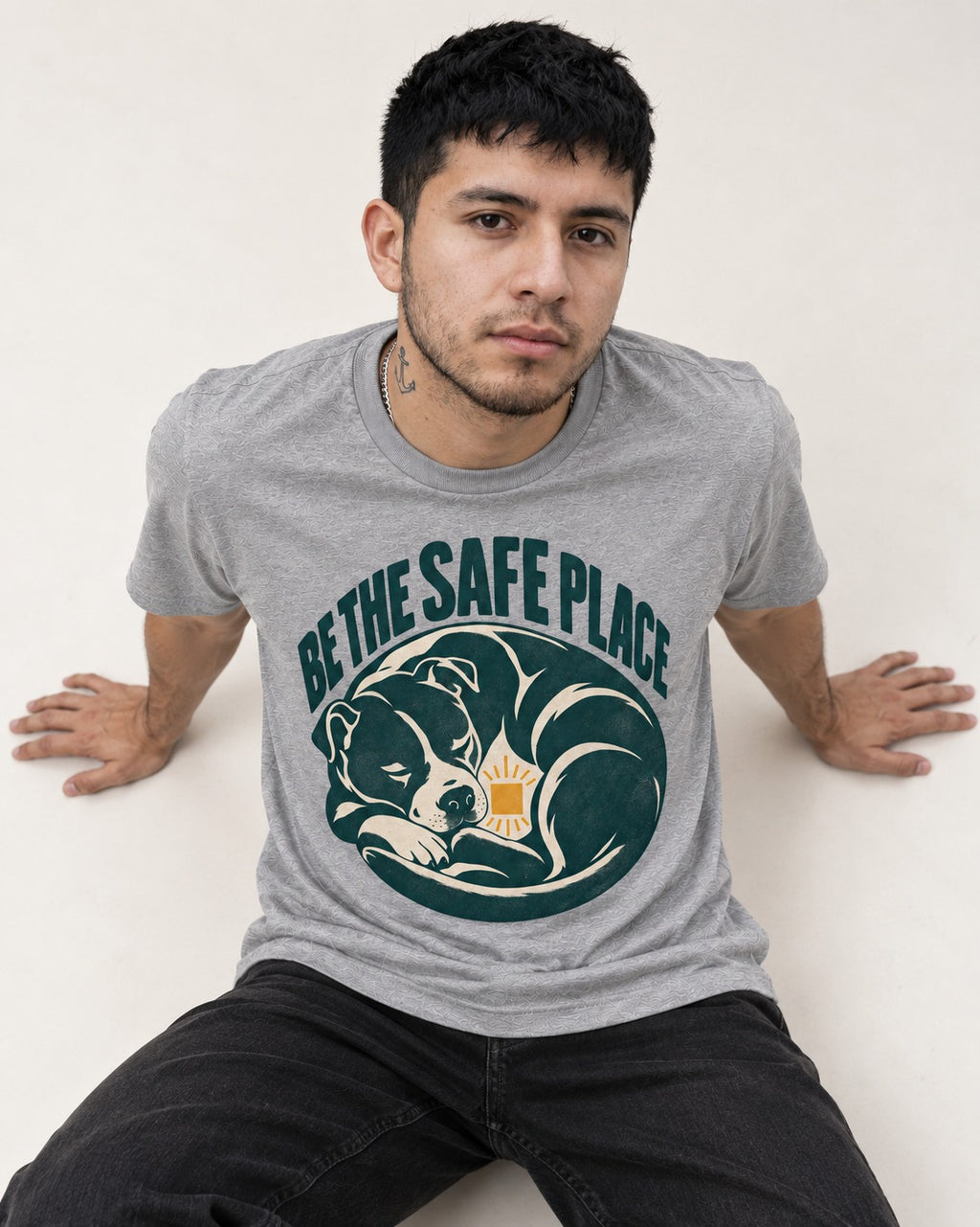 Pitbull Safe Place T-Shirt in Sport Grey, worn by a seated model