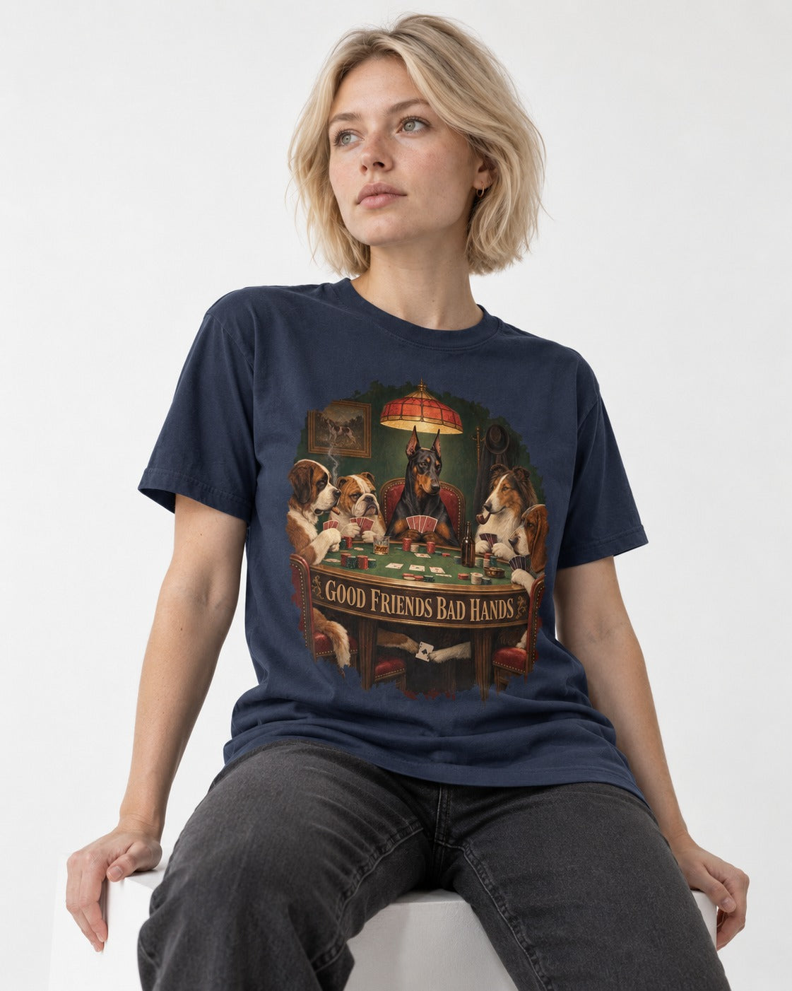 Doberman Good Friends Bad Hands Poker Night Graphic T-Shirt in Navy, worn by a seated model