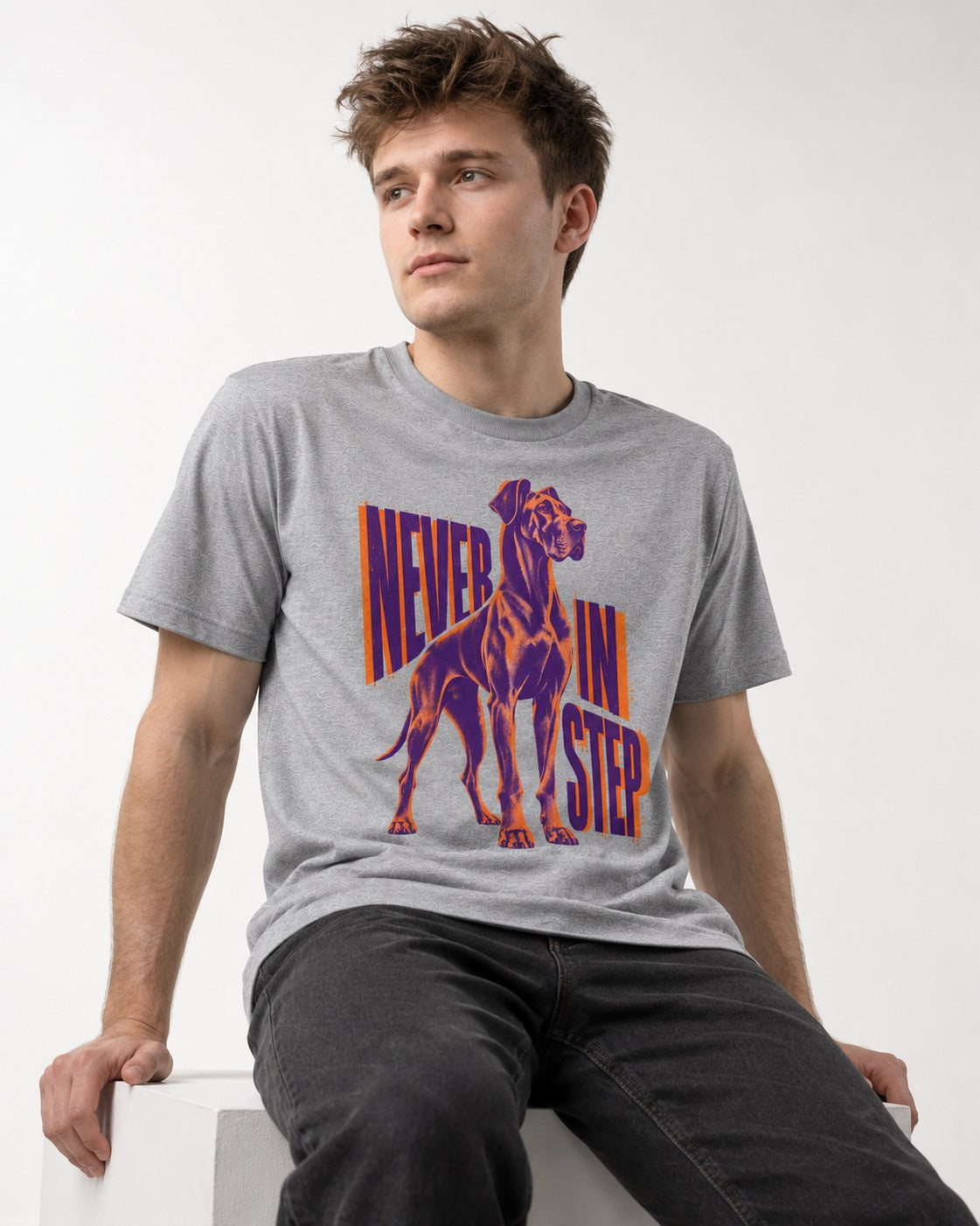Great Dane Never in Step Standing Graphic T-Shirt in Sport Grey, worn by a seated model