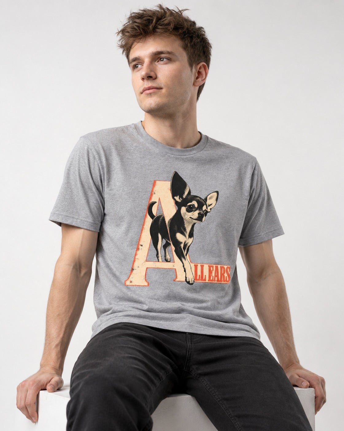 All Ears Chihuahua T-Shirt in Sport Grey, worn by a seated model