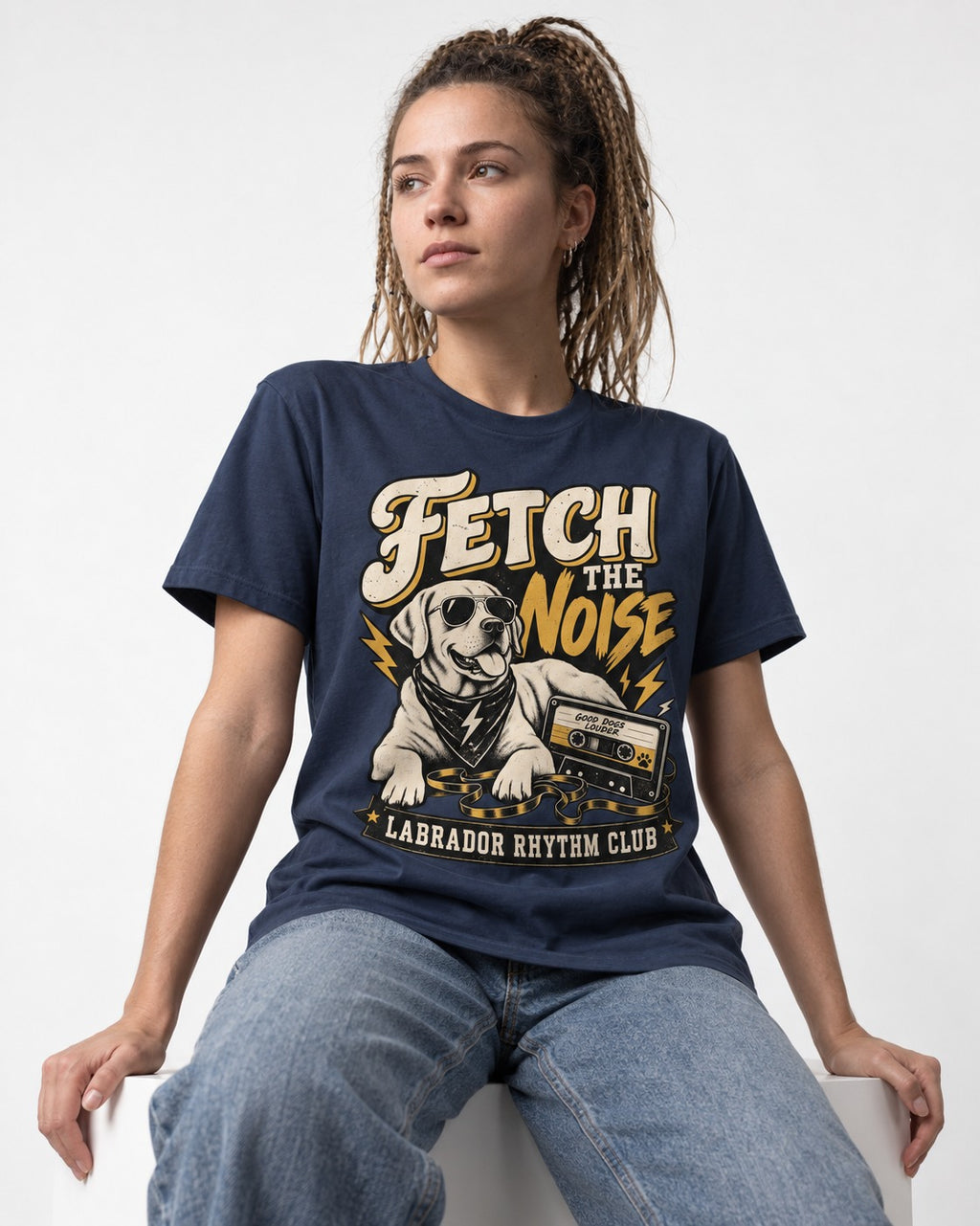 Labrador Retriever Fetch the Noise Rhythm Club DJ Graphic T-Shirt in Navy, worn by a seated model