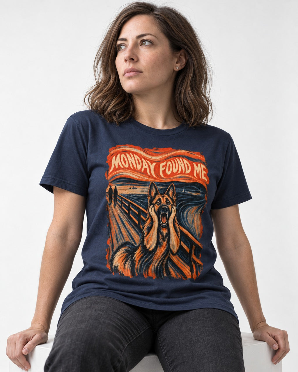 German Shepherd Dog Monday Found Me Scream Graphic T-Shirt in Navy, worn by a seated model