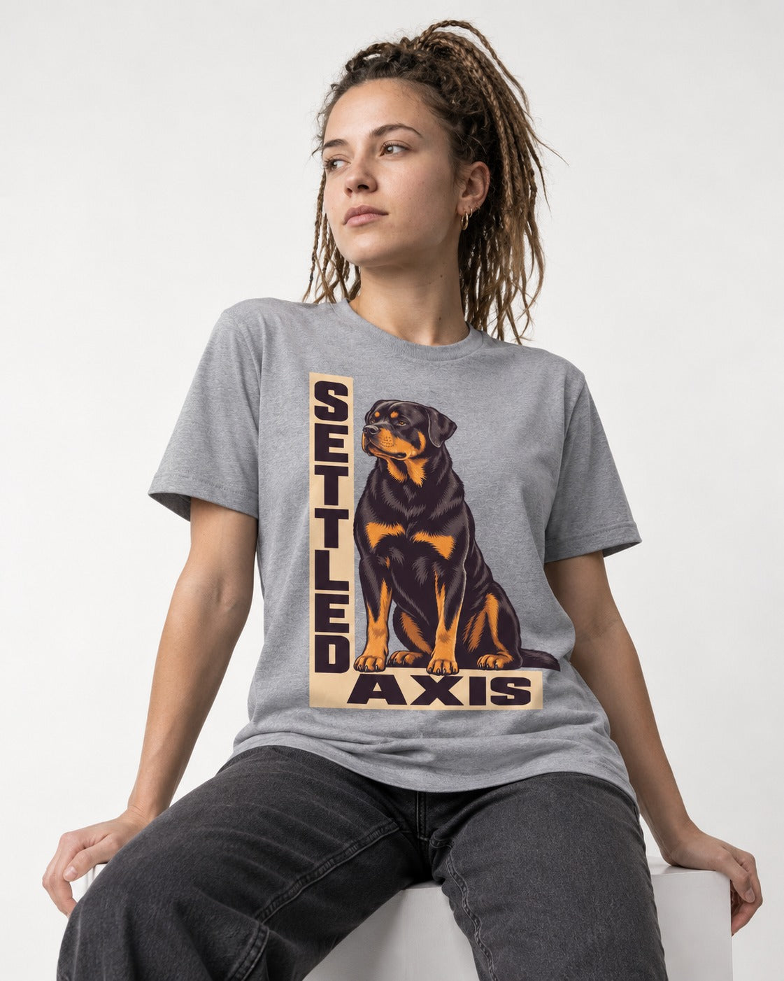 Settled Axis Rottweiler T-Shirt in Sport Grey, worn by a seated model