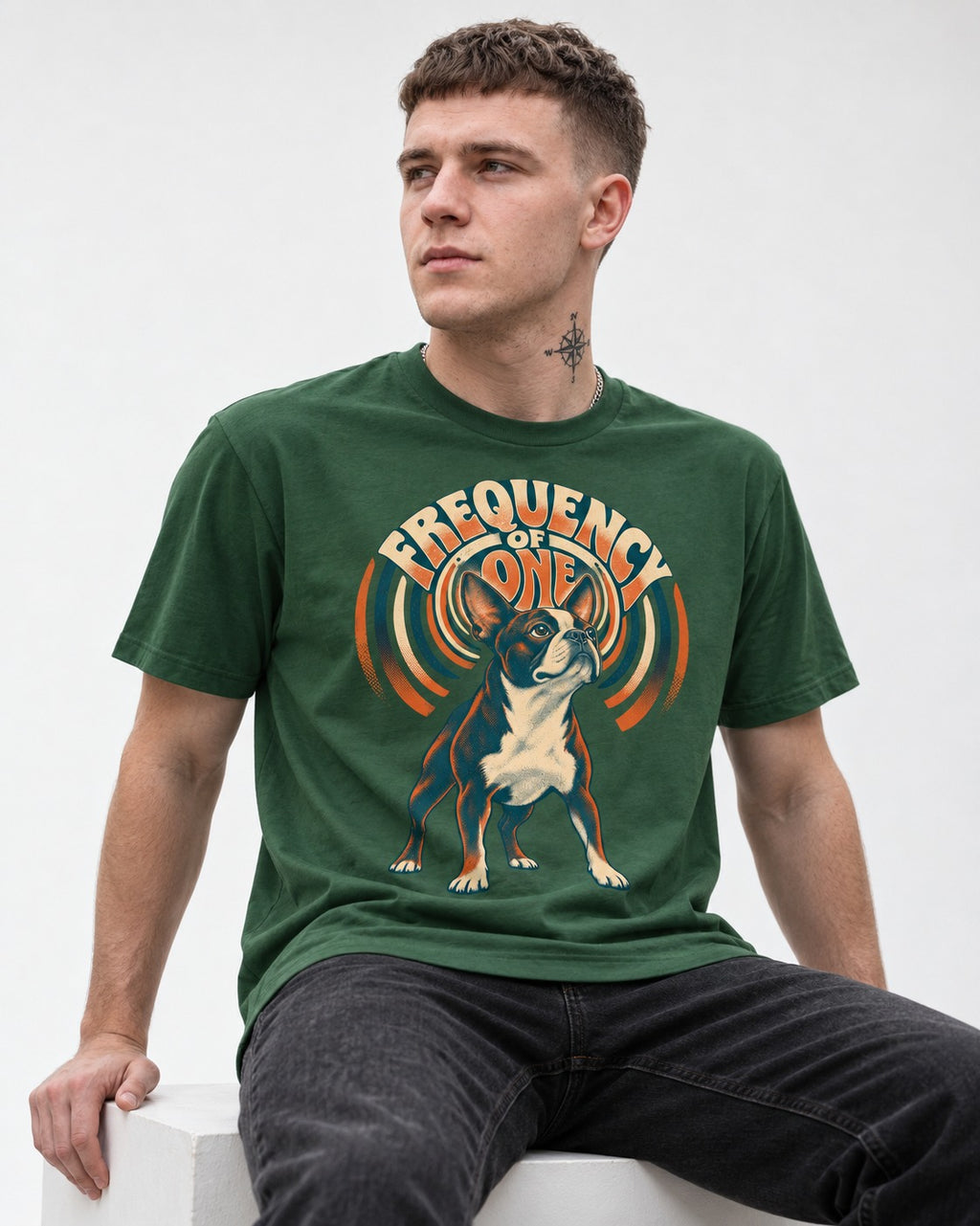 Frequency of One Boston Terrier Graphic T-Shirt in Forest Green, worn by a seated model