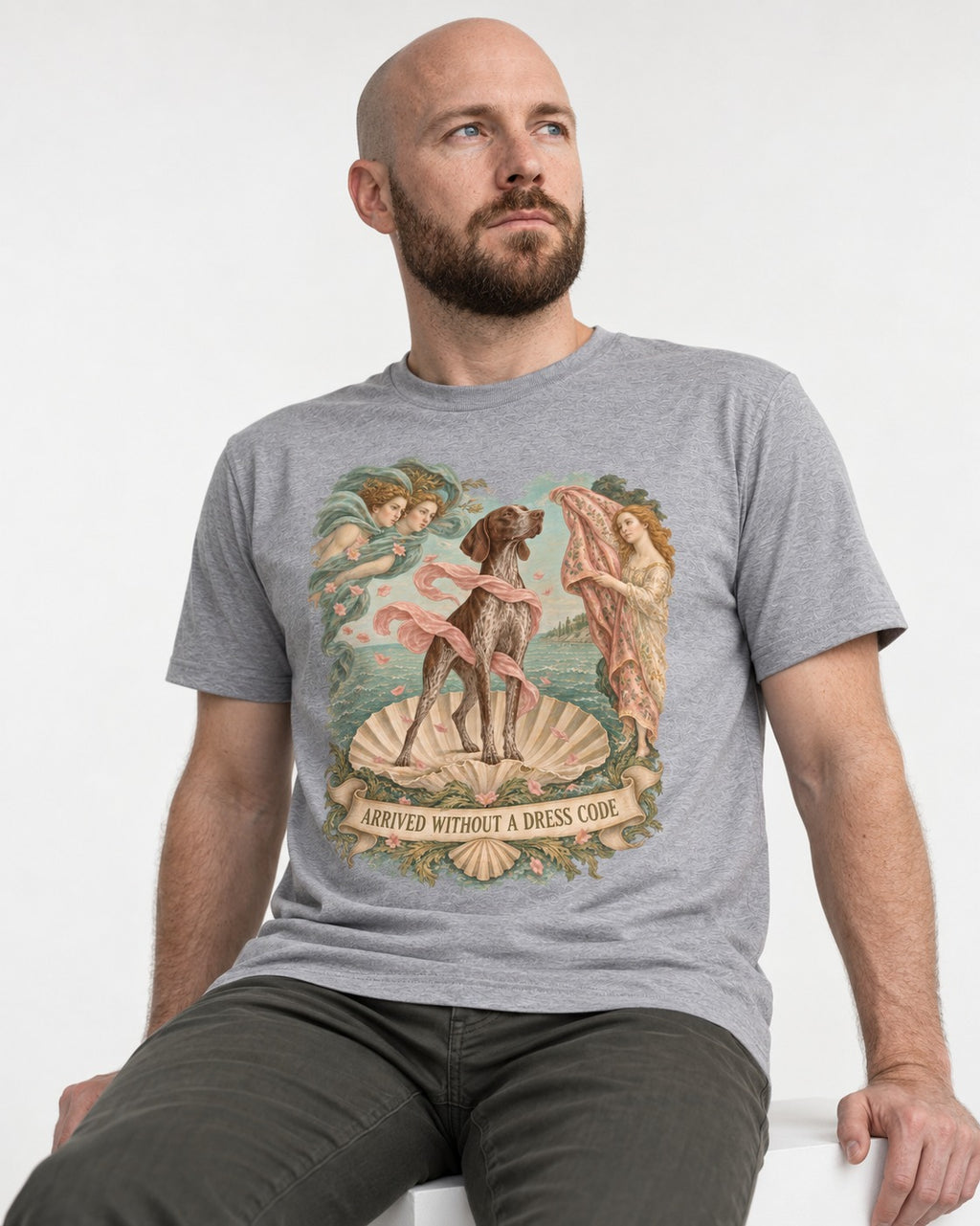 German Shorthaired Pointer Arrived Without A Dress Code Birth Of Venus Graphic T-Shirt in Sport Grey, worn by a seated model
