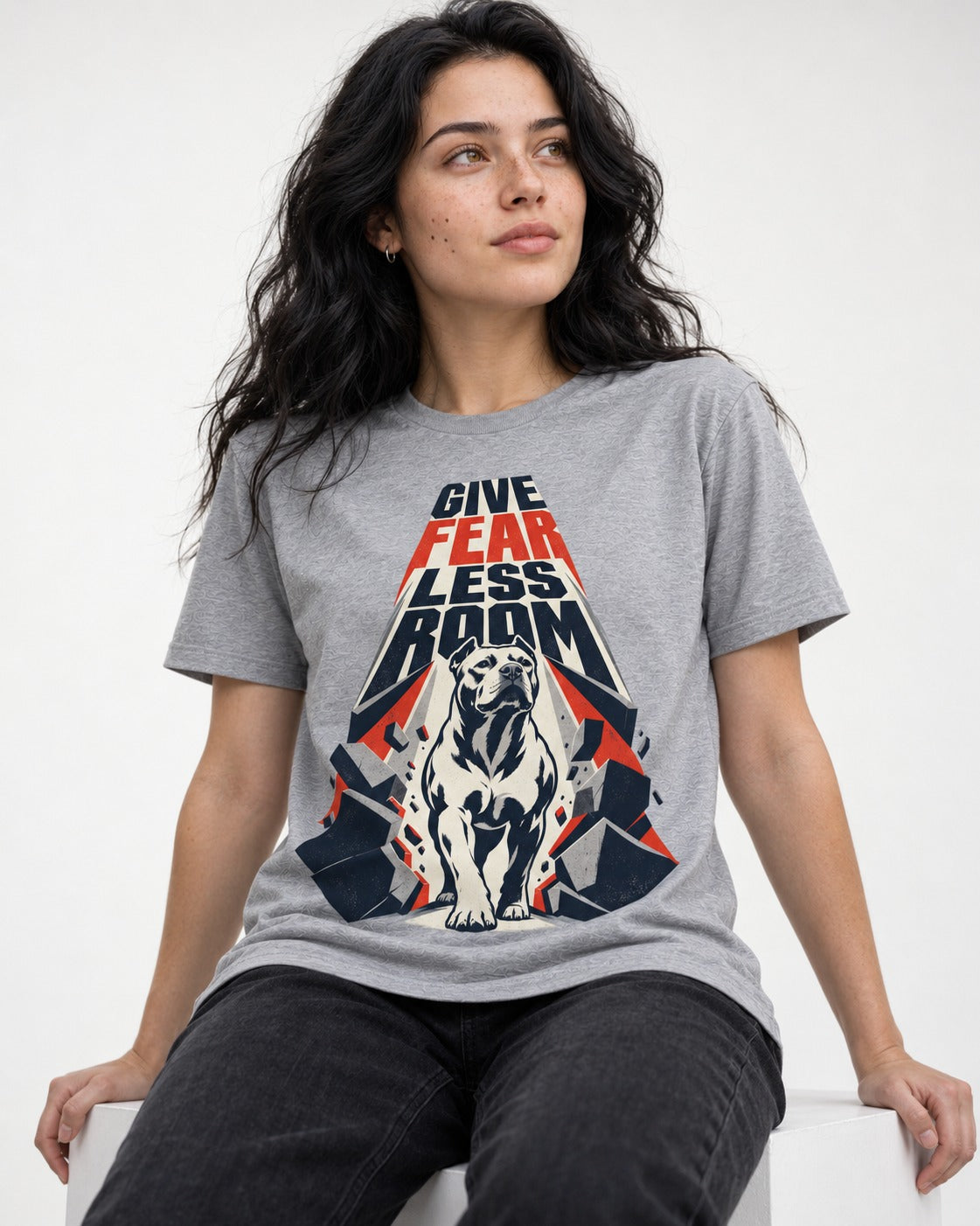 Pitbull Give Fear Less Room Breakthrough Graphic T-Shirt in Sport Grey, worn by a seated model