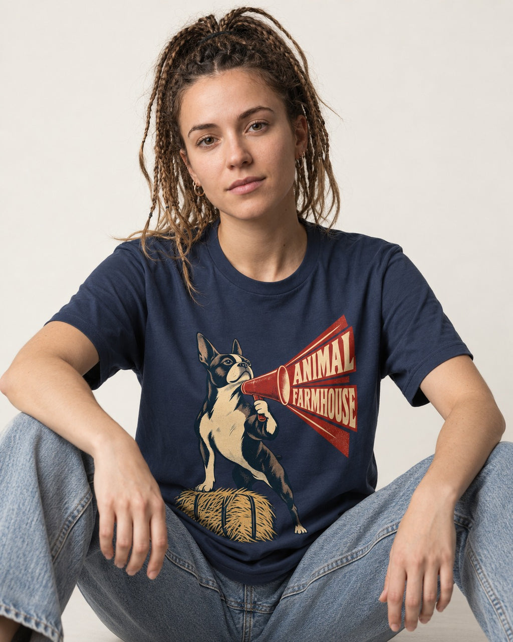 Animal Farmhouse Boston Terrier T-Shirt in Navy, worn by a seated model