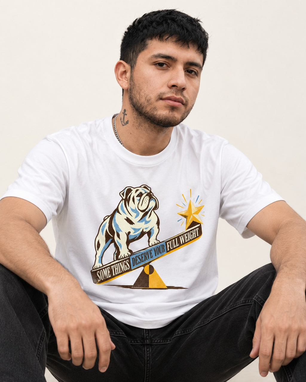 Some Things Deserve Your Full Weight English Bulldog Graphic T-Shirt in White, worn by a seated model