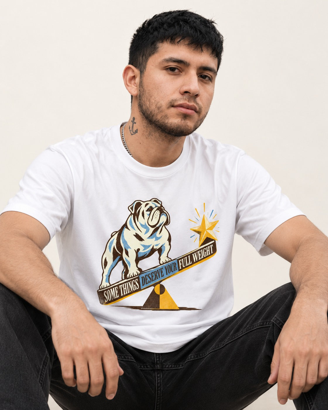 Some Things Deserve Your Full Weight English Bulldog Graphic T-Shirt in White, worn by a seated model