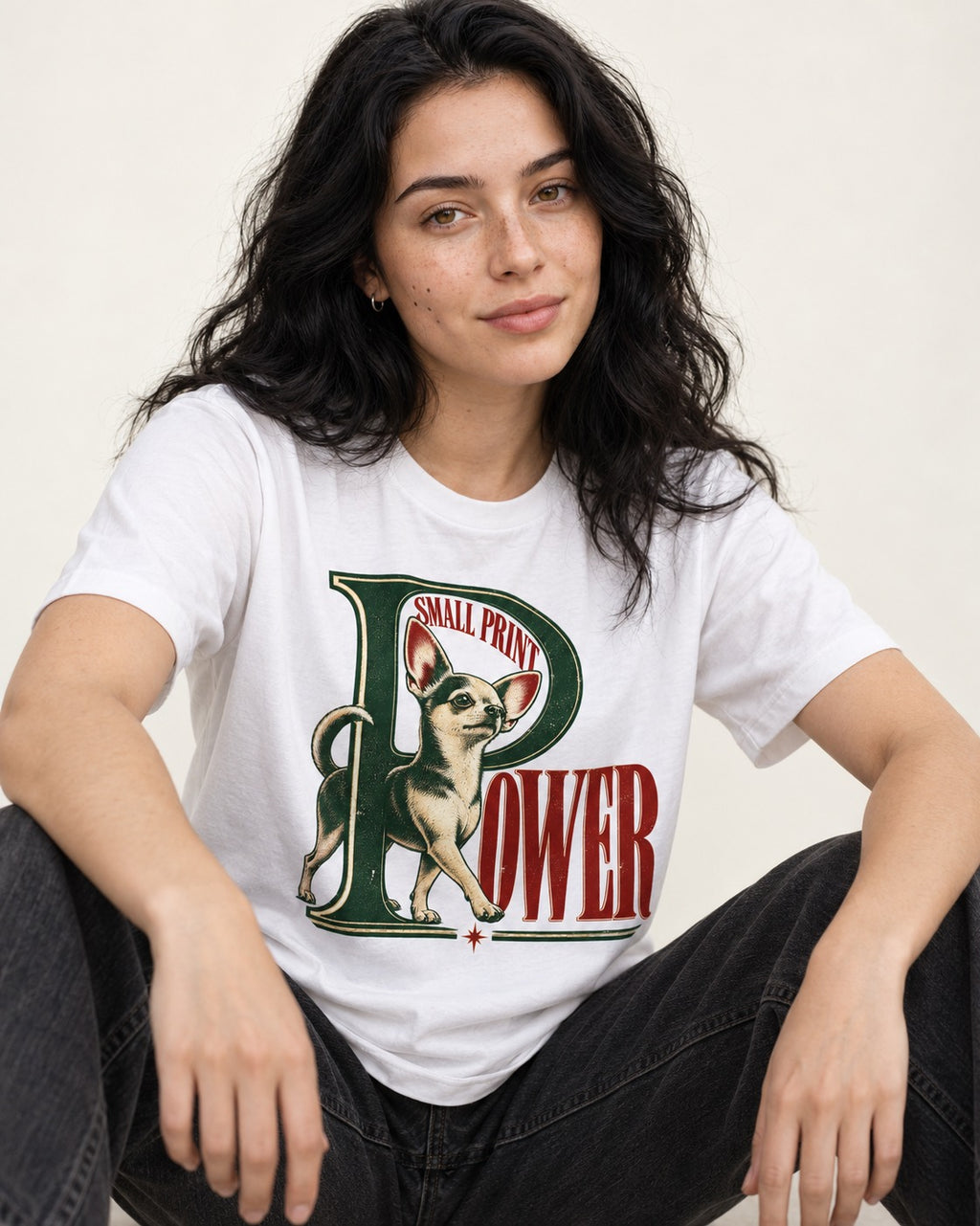 Chihuahua Small Print Power Monogram Graphic T-Shirt in White, worn by a seated model