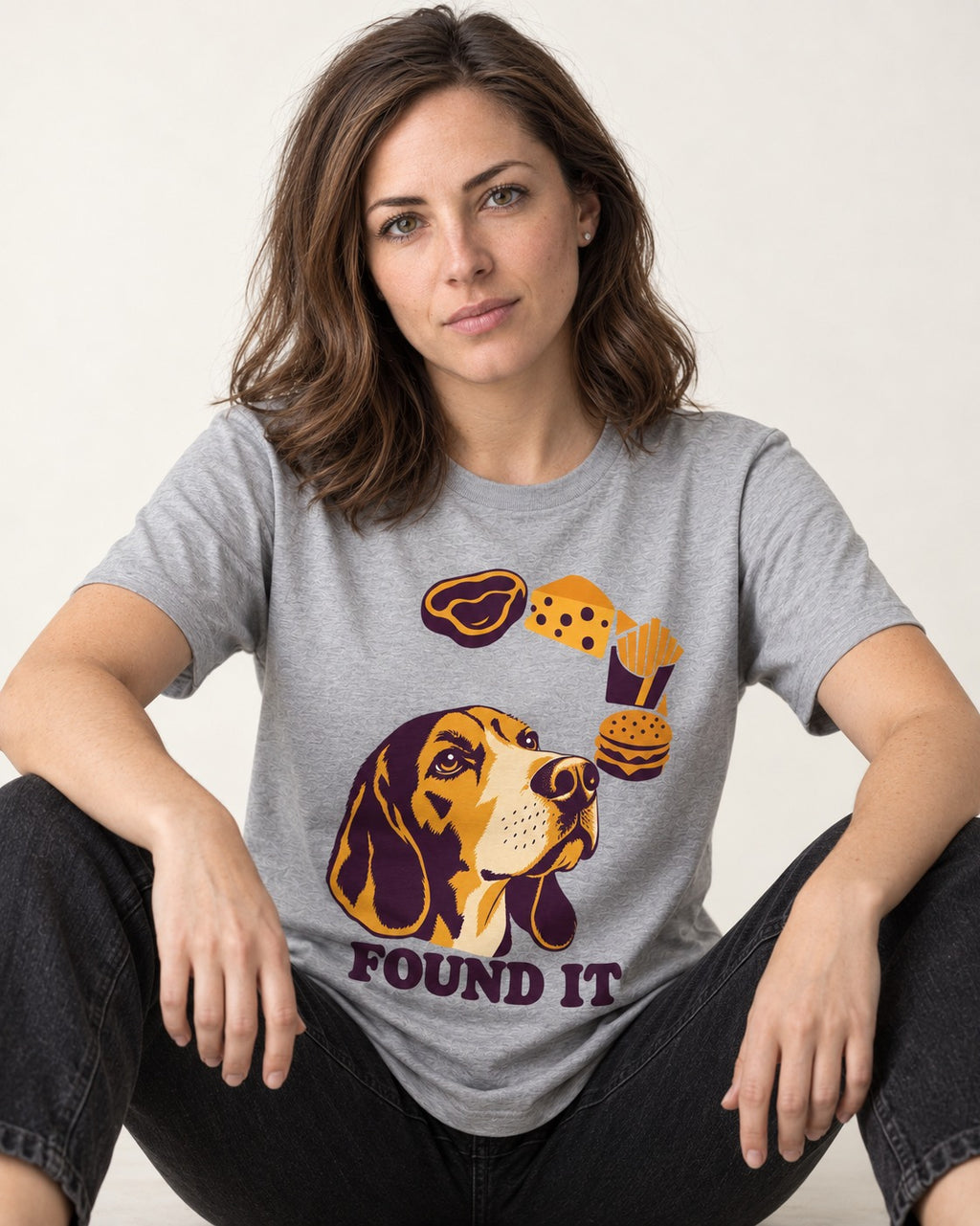 Beagle Found It T-Shirt in Sport Grey, worn by a seated model