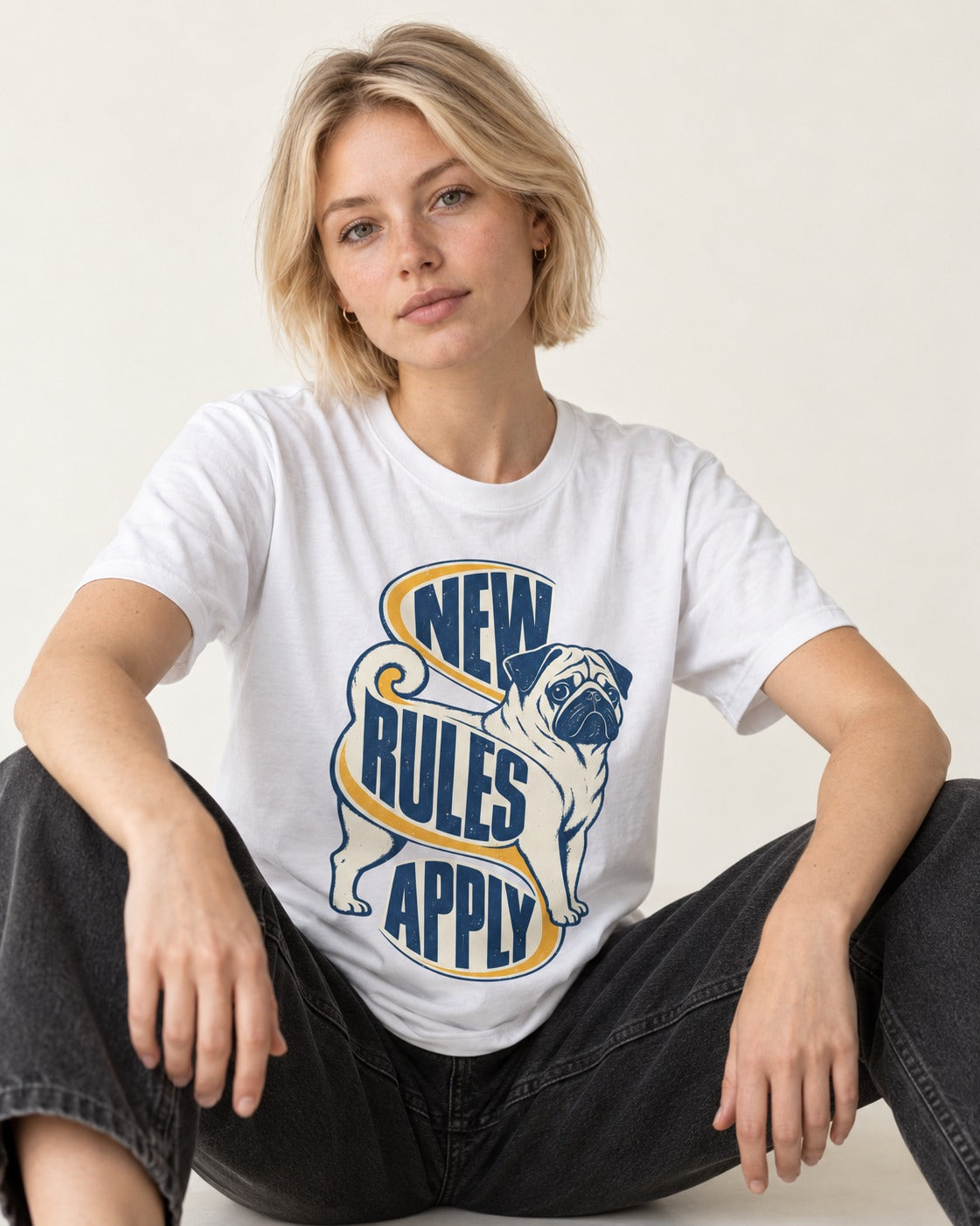 Pug New Rules Apply Ribbon Graphic T-Shirt in White, worn by a seated model