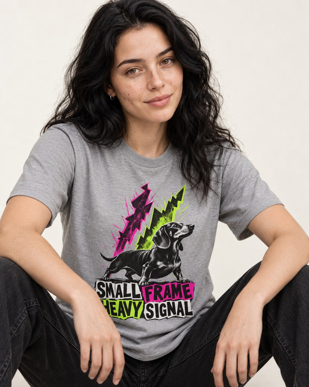 Dachshund Small Frame Heavy Signal T-Shirt in Sport Grey, worn by a seated model