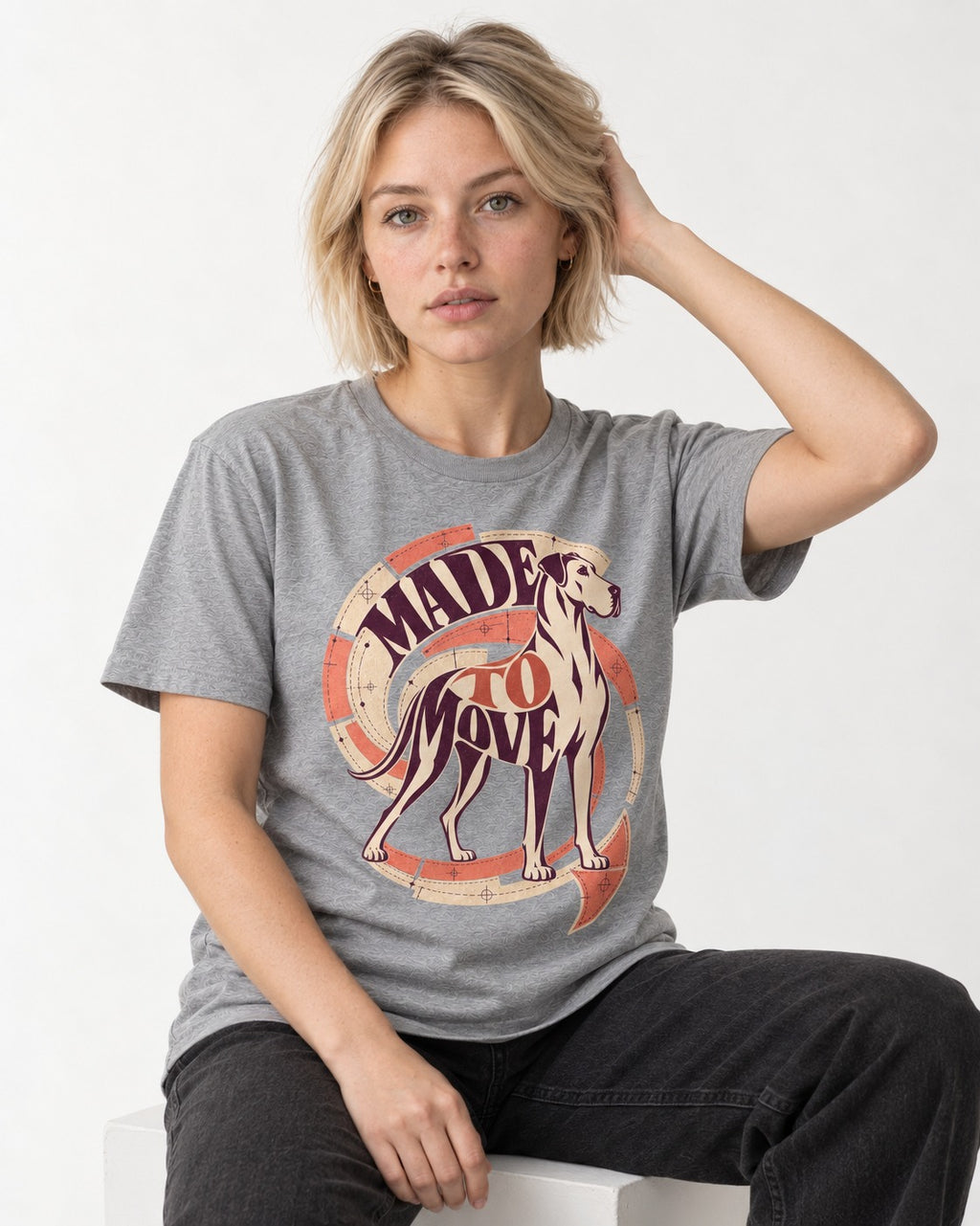 Great Dane Made to Move T-Shirt in Sport Grey, worn by a seated model
