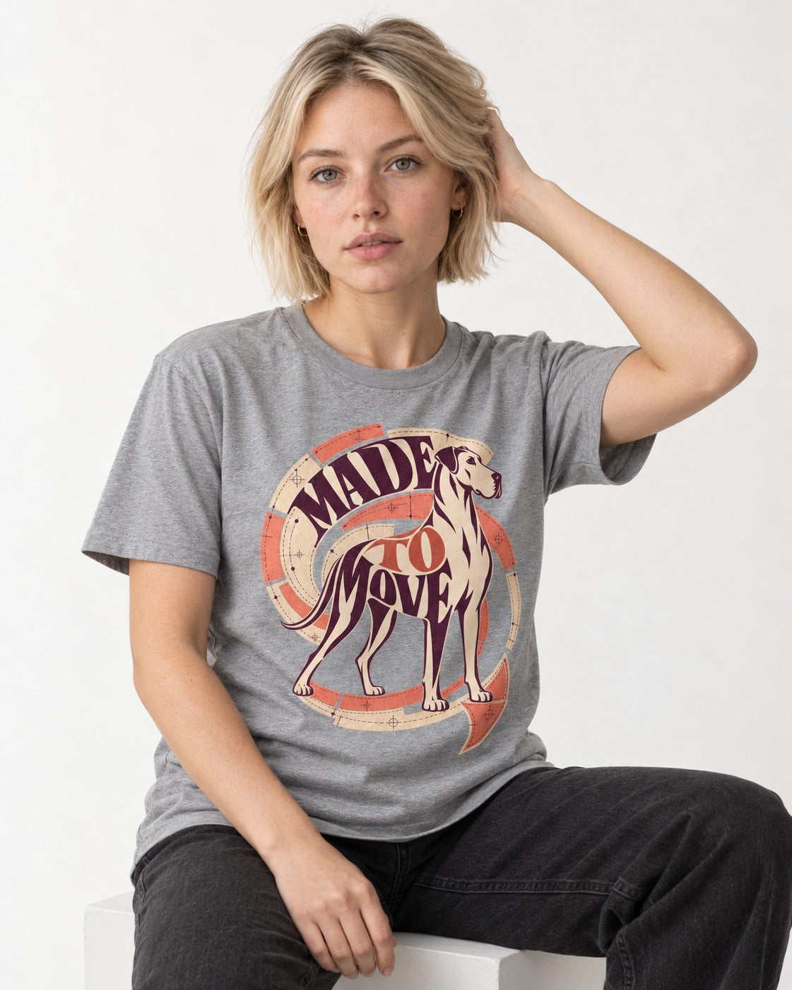 Great Dane Made to Move T-Shirt in Sport Grey, worn by a seated model