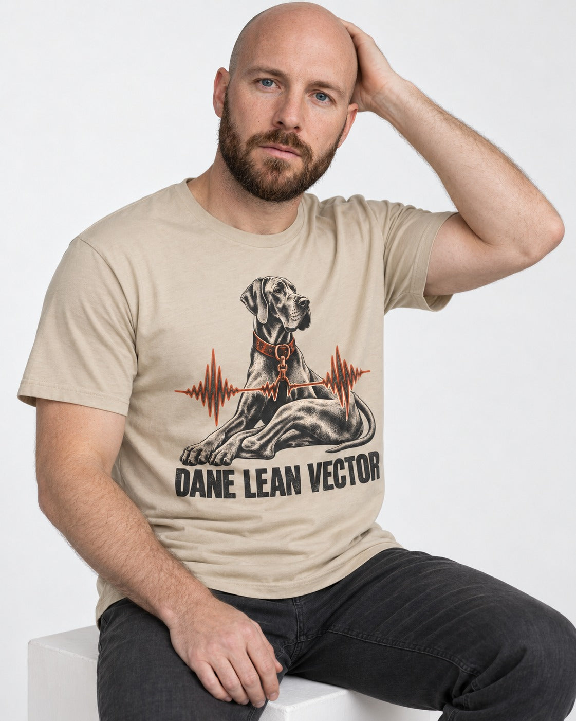 Great Dane Lean T-Shirt in Sand, worn by a seated model
