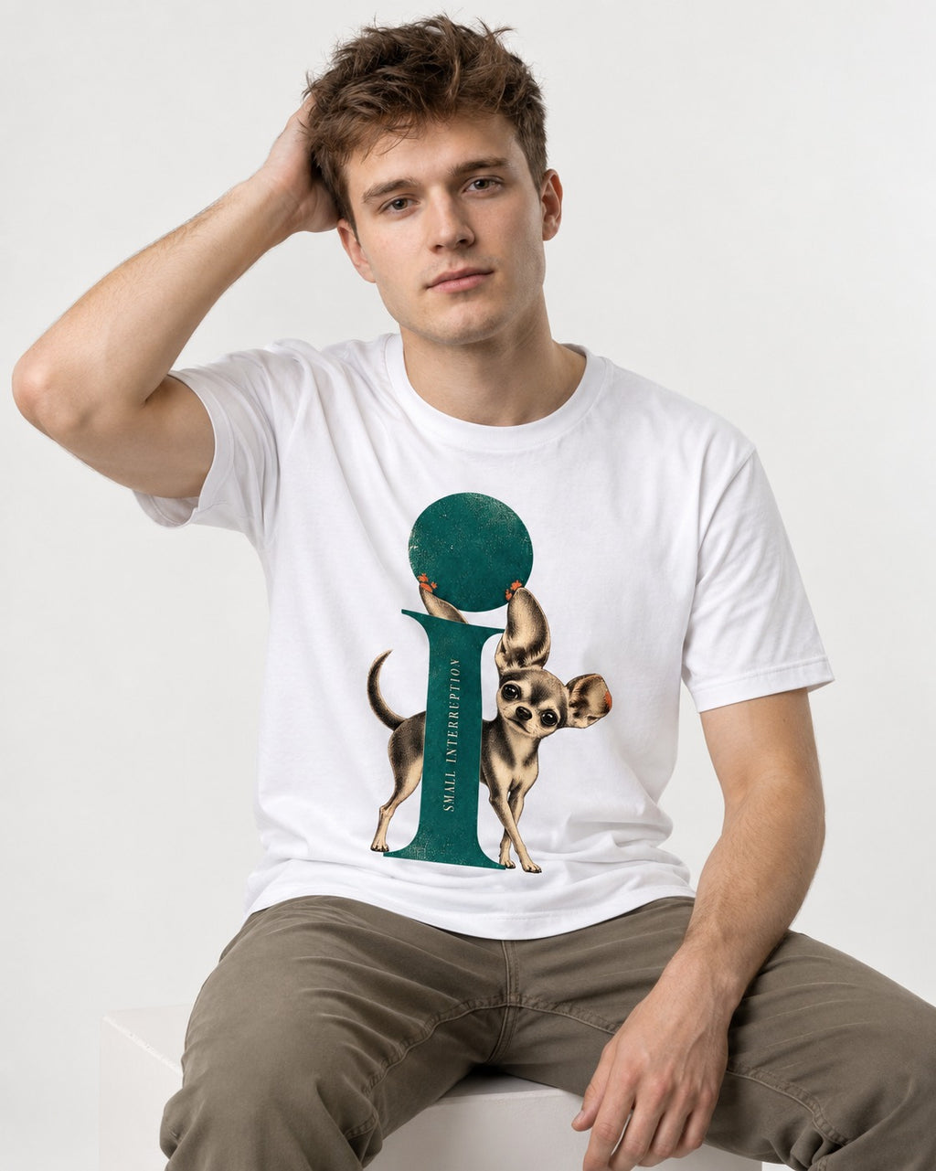 Chihuahua Small Interruption Geometric Portrait T-Shirt in White, worn by a seated model
