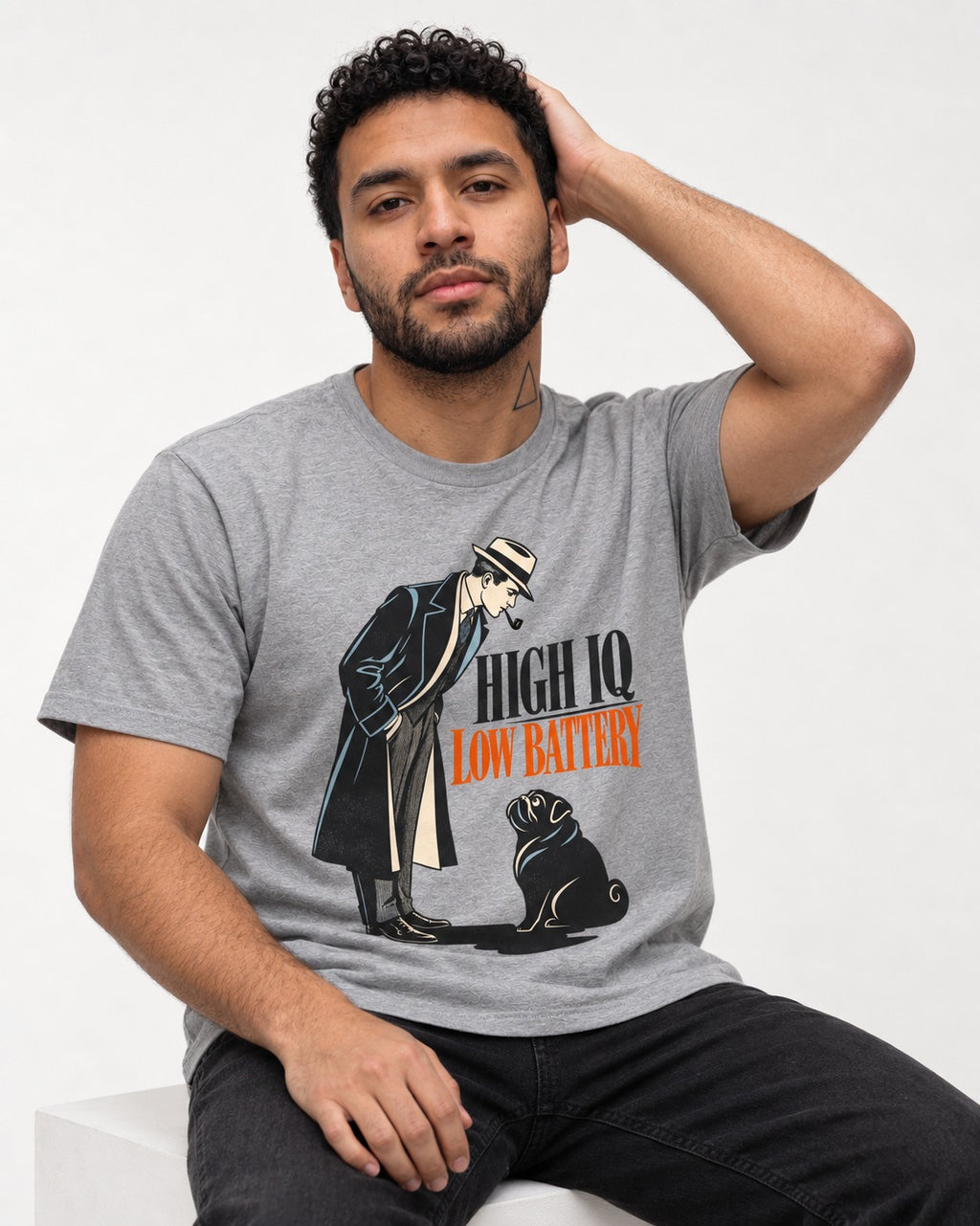 High Iq Low Battery Pug T-Shirt in Sport Grey, worn by a seated model