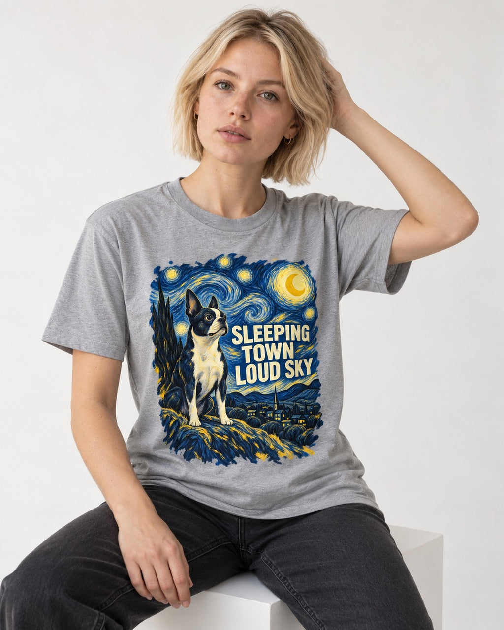 Sleeping Town Loud Sky Boston Terrier Starry Night T-Shirt in Sport Grey, worn by a seated model
