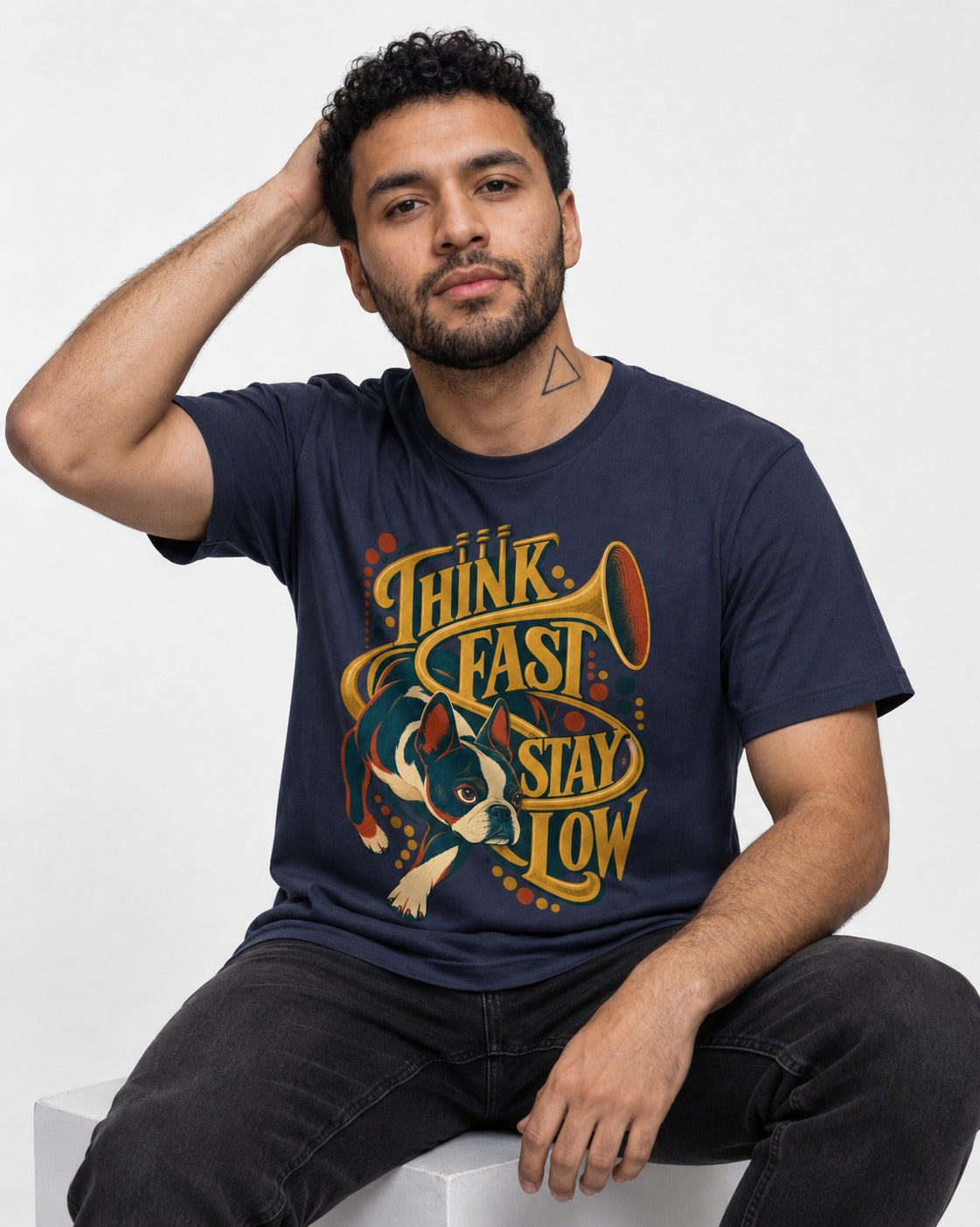 Boston Terrier Think Fast Stay Low T-Shirt in Navy, worn by a seated model