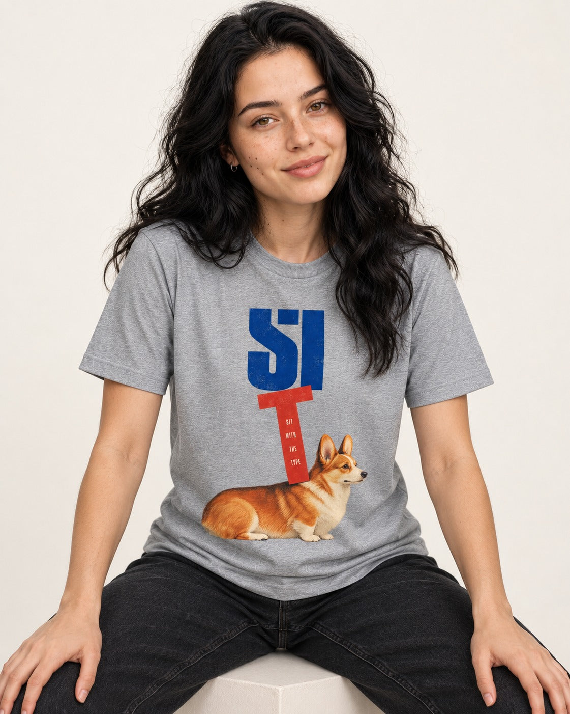 Sit with the Corgi T-Shirt in Sport Grey, worn by a seated model