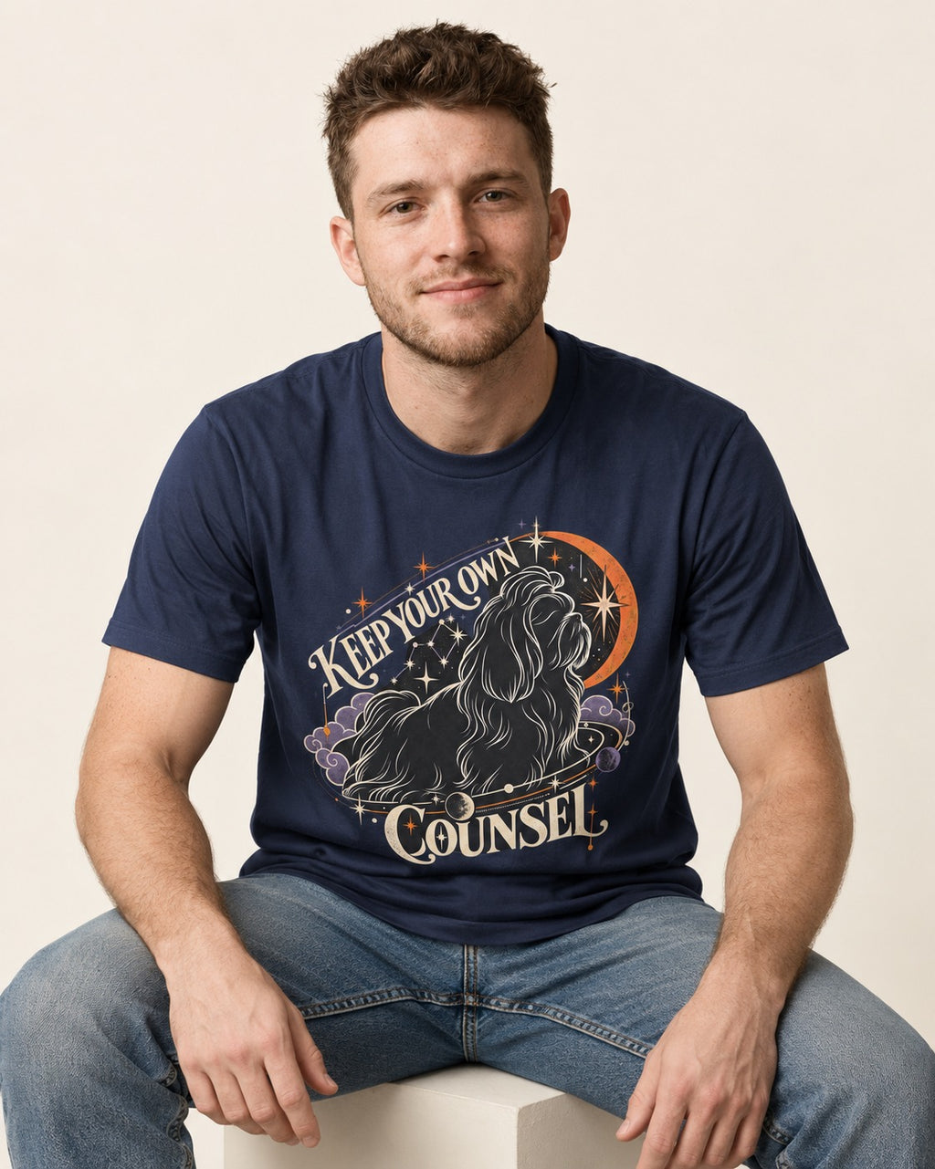Shih Tzu Keep Your Own Counsel Celestial Graphic T-Shirt in Navy, worn by a seated model