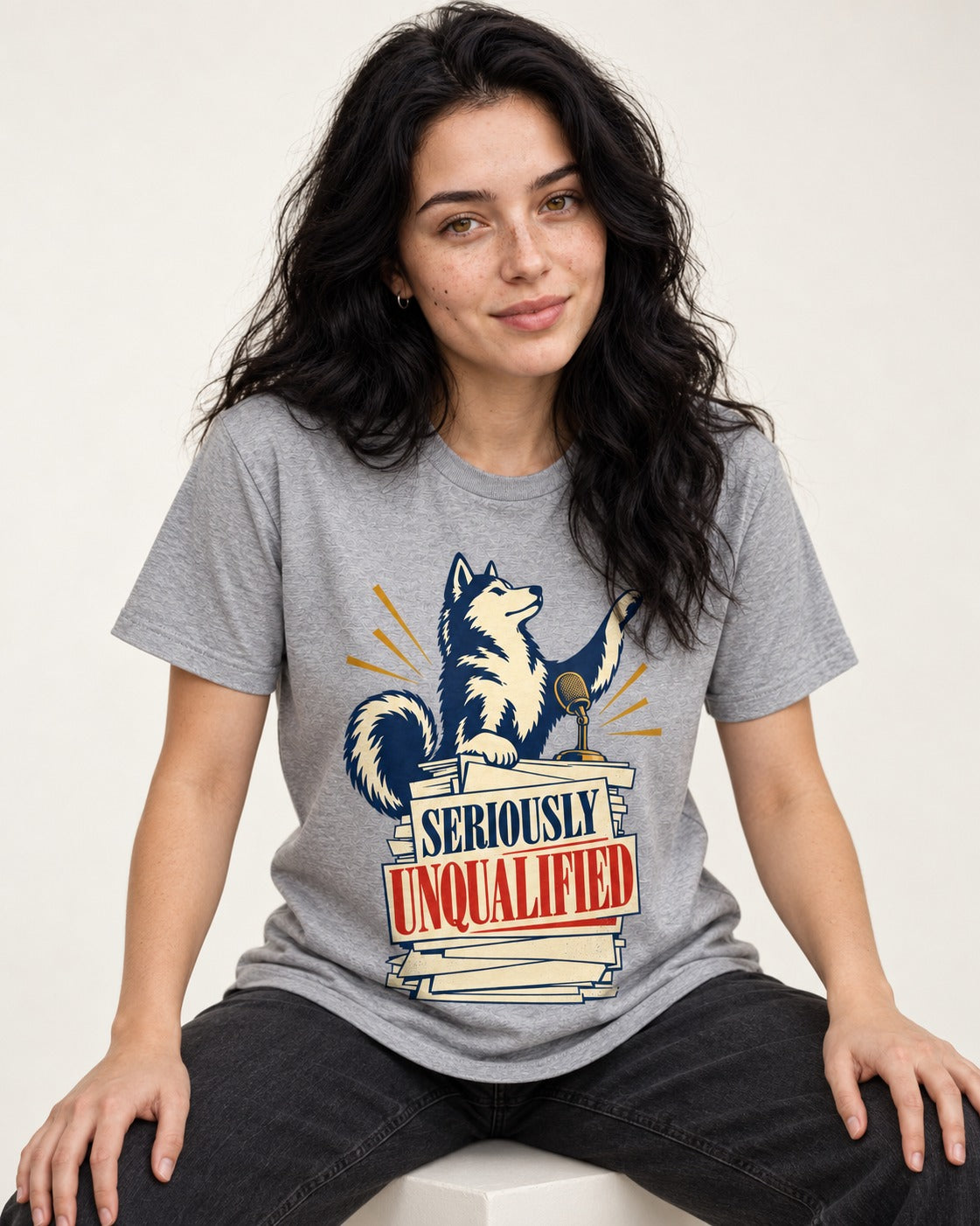 Seriously Unqualified Husky T-Shirt in Sport Grey, worn by a seated model
