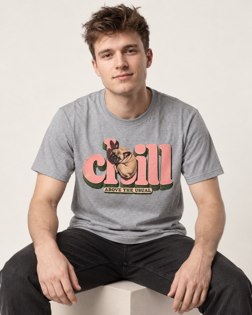 Frenchie Chill T-Shirt in Sport Grey, worn by a seated model