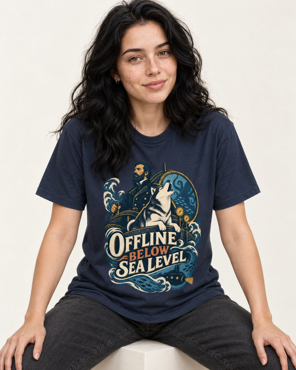 Husky Offline Below Sea Level Nautical Submarine Graphic T-Shirt in Navy, worn by a seated model