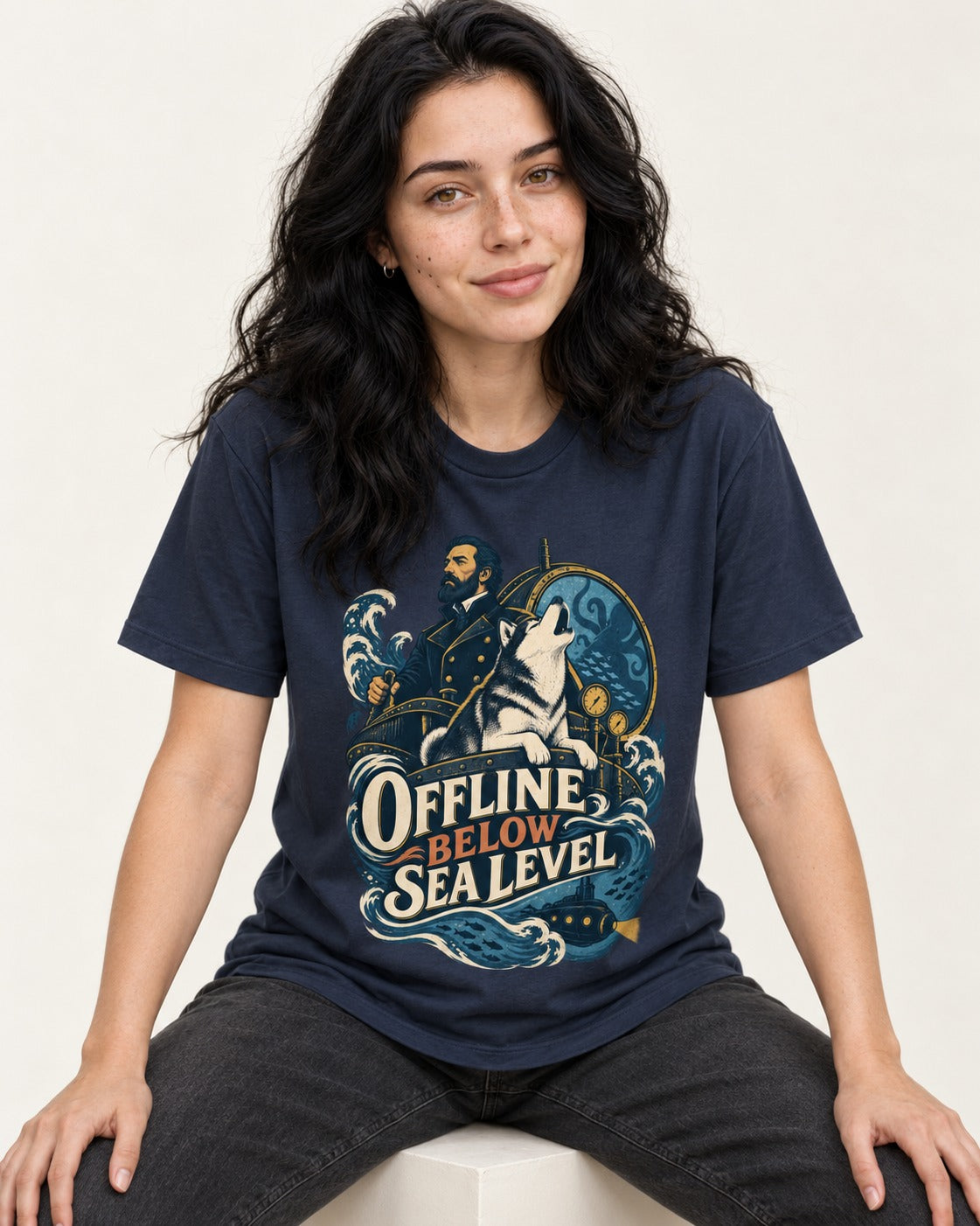 Husky Offline Below Sea Level Nautical Submarine Graphic T-Shirt in Navy, worn by a seated model