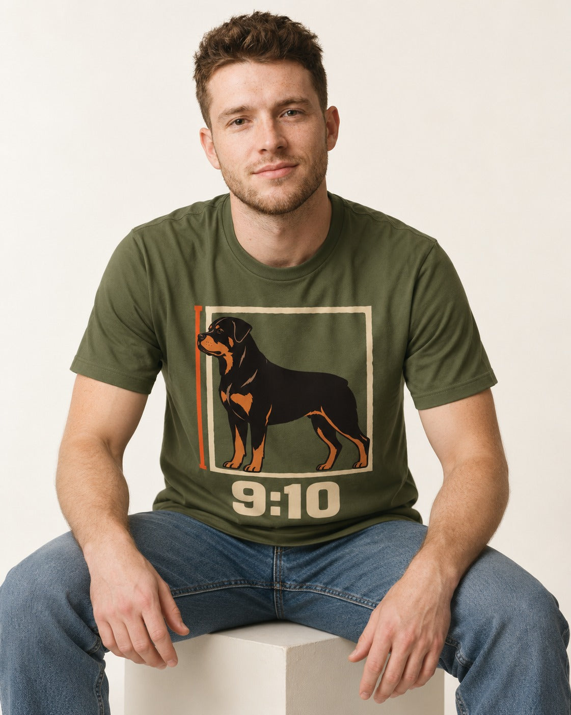 Nine Ten Rottweiler Proportion Frame Graphic T-Shirt in Heather Military Green, worn by a seated model