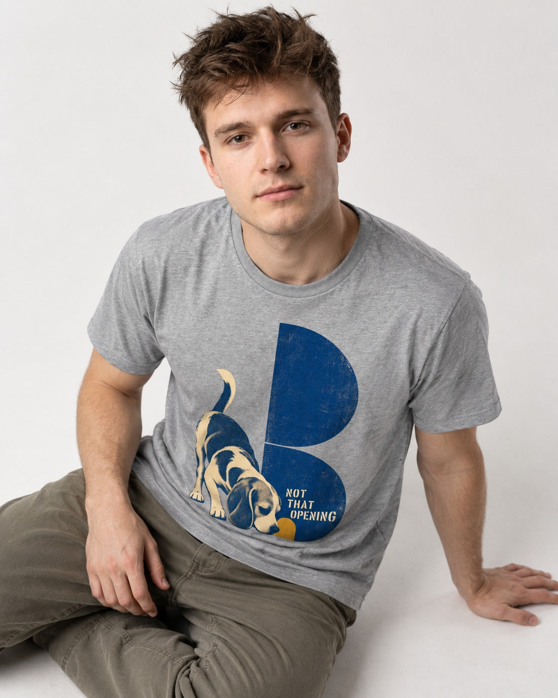 Not That Opening Beagle T-Shirt in Sport Grey, worn by a seated model