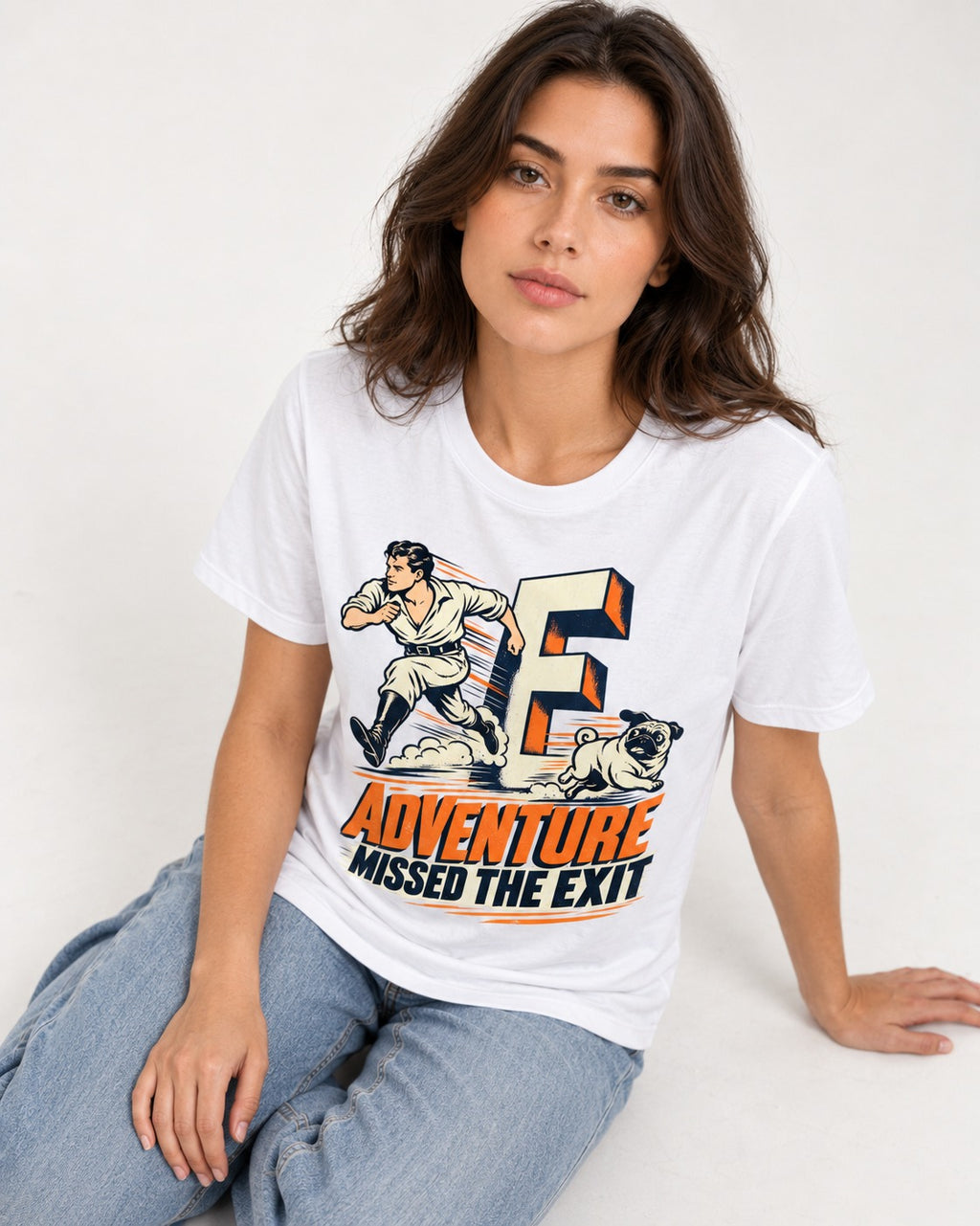 Pug Adventure Missed the Exit Running Graphic T-Shirt in White, worn by a seated model