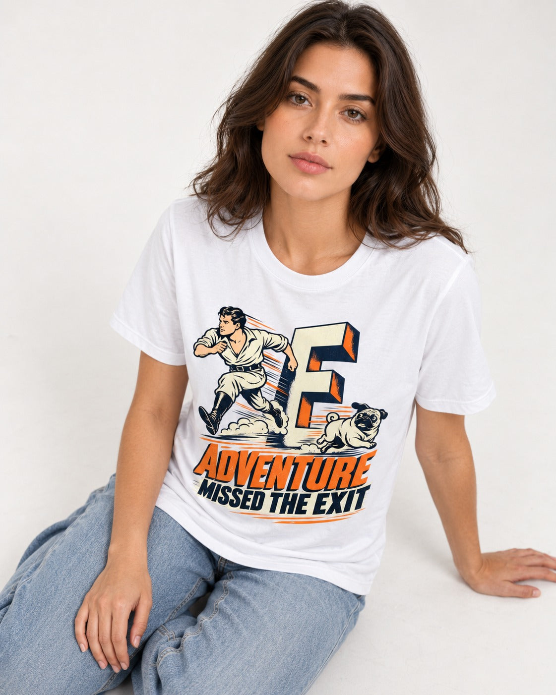Pug Adventure Missed the Exit Running Graphic T-Shirt in White, worn by a seated model