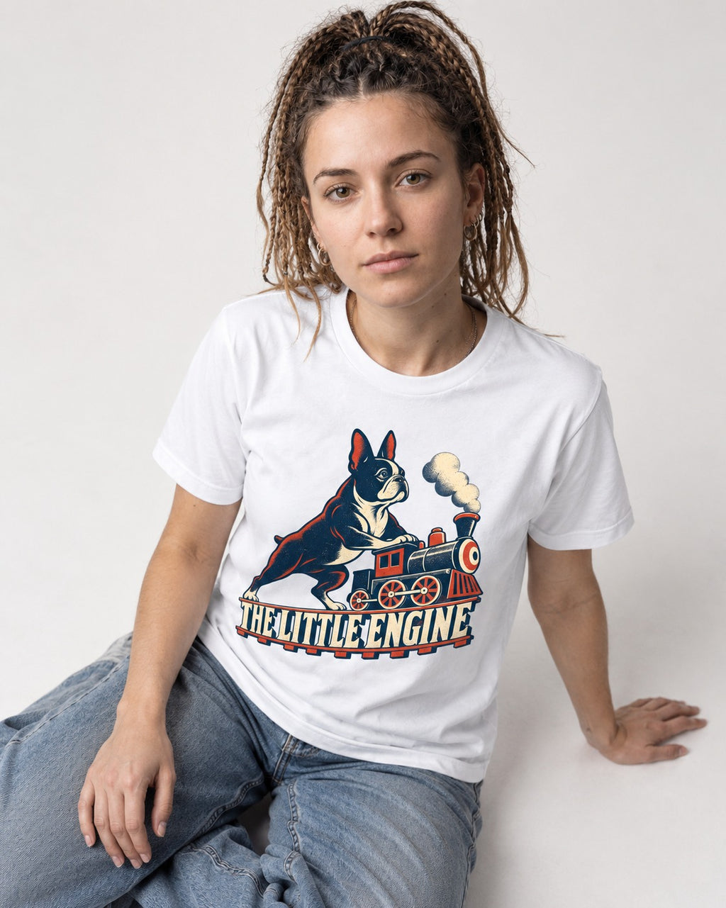 Boston Terrier The Little Engine T-Shirt in White, worn by a seated model