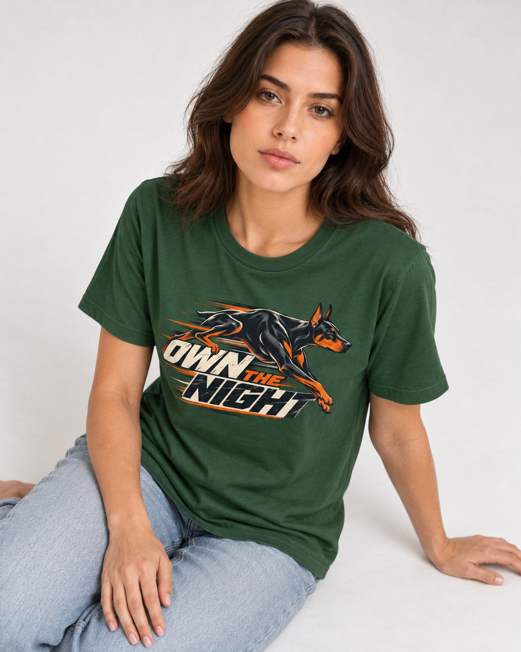 Doberman Own the Night Speed Graphic T-Shirt in Forest Green, worn by a seated model