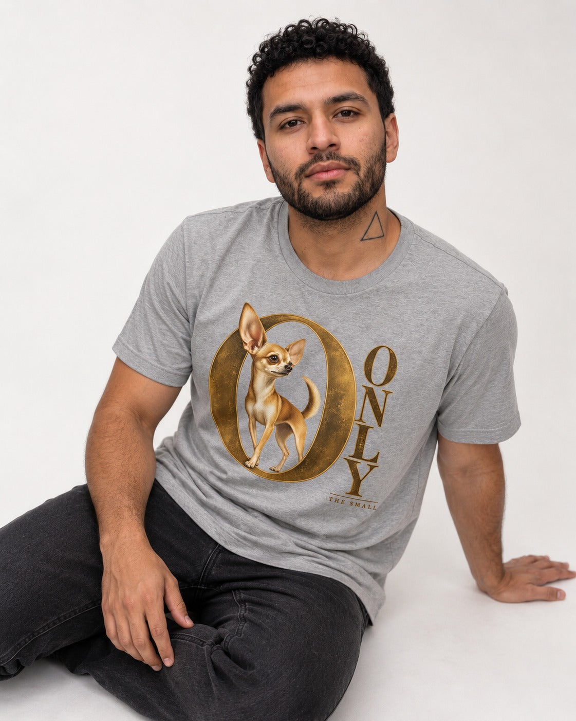 Chihuahua Only the Small T-Shirt in Sport Grey, worn by a seated model