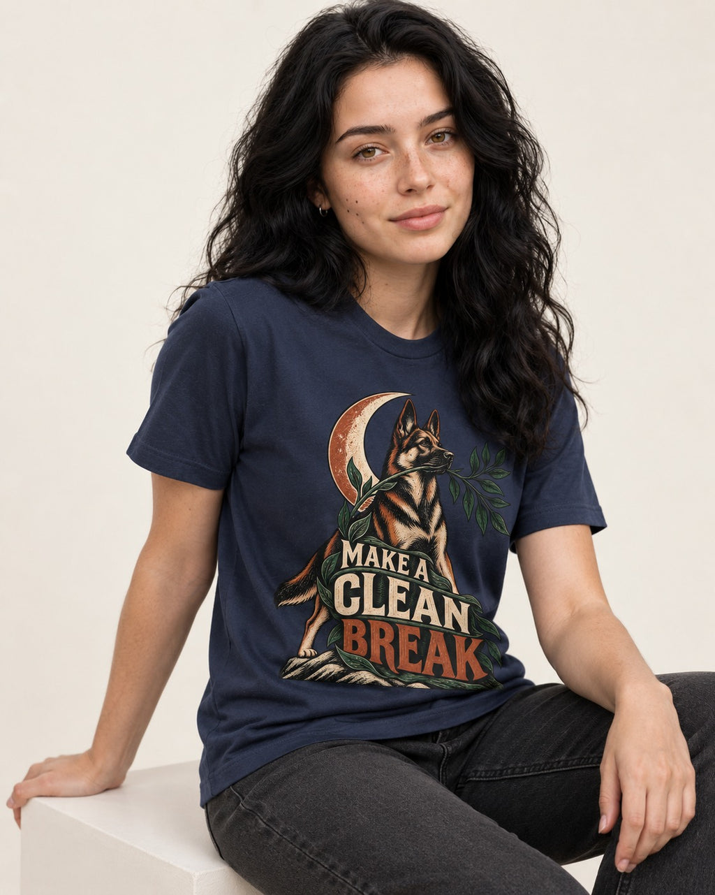Make A Clean Break Crescent Botanical German Shepherd Dog Graphic T-Shirt in Navy, worn by a seated model