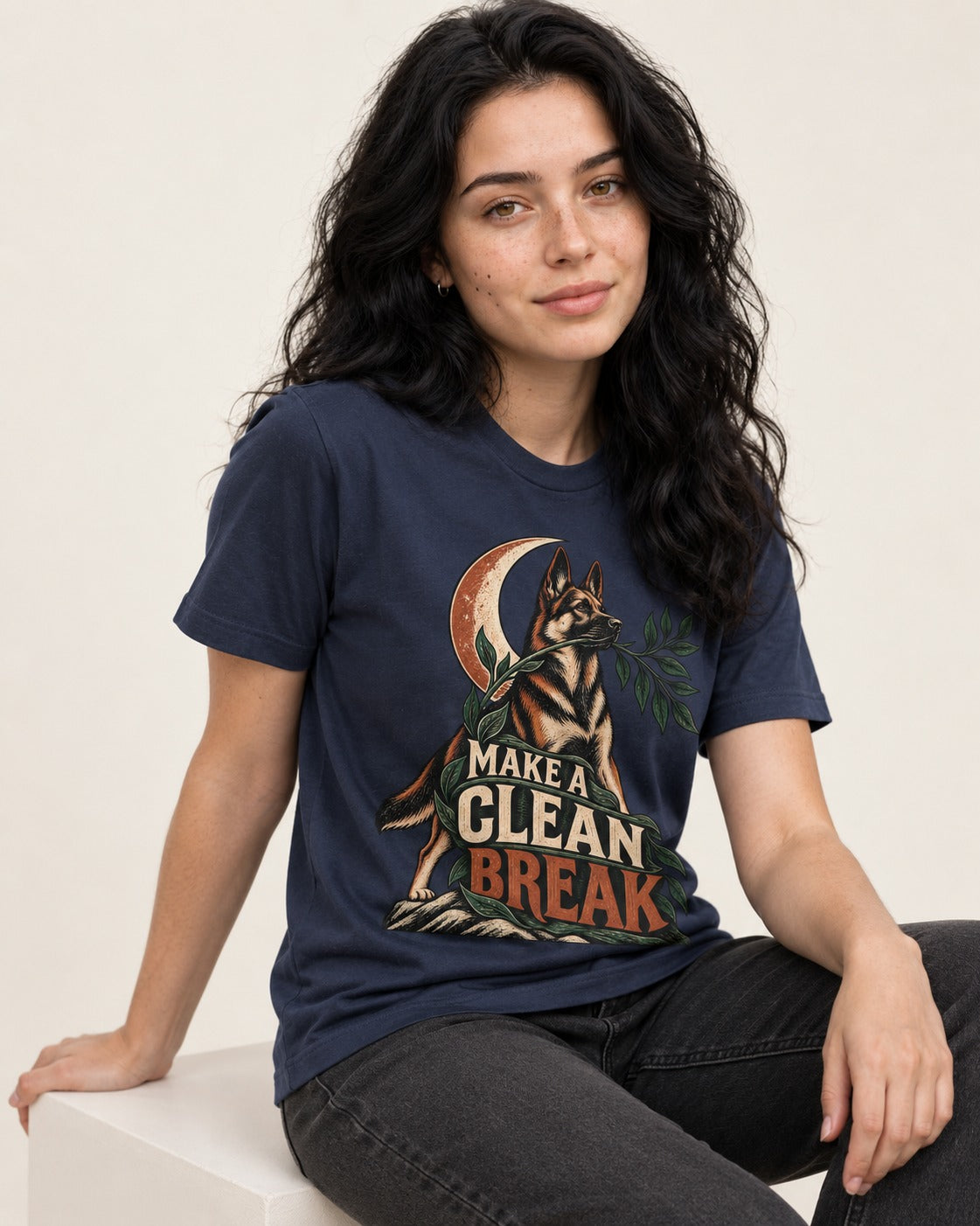 Make A Clean Break Crescent Botanical German Shepherd Dog Graphic T-Shirt in Navy, worn by a seated model