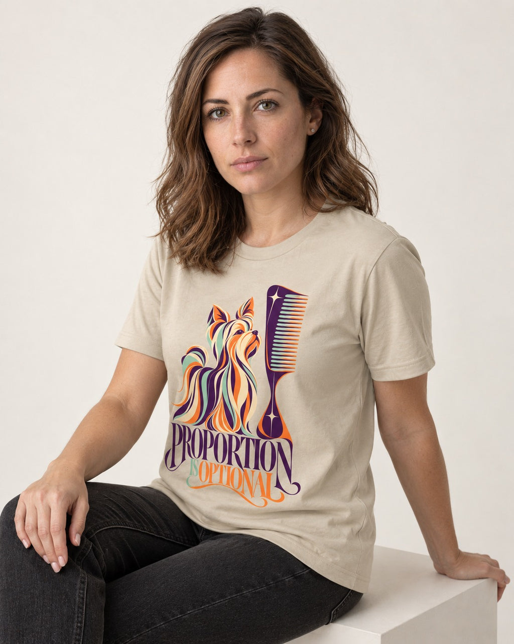 Yorkshire Terrier Proportion Is Optional T-Shirt in Sand, worn by a seated model